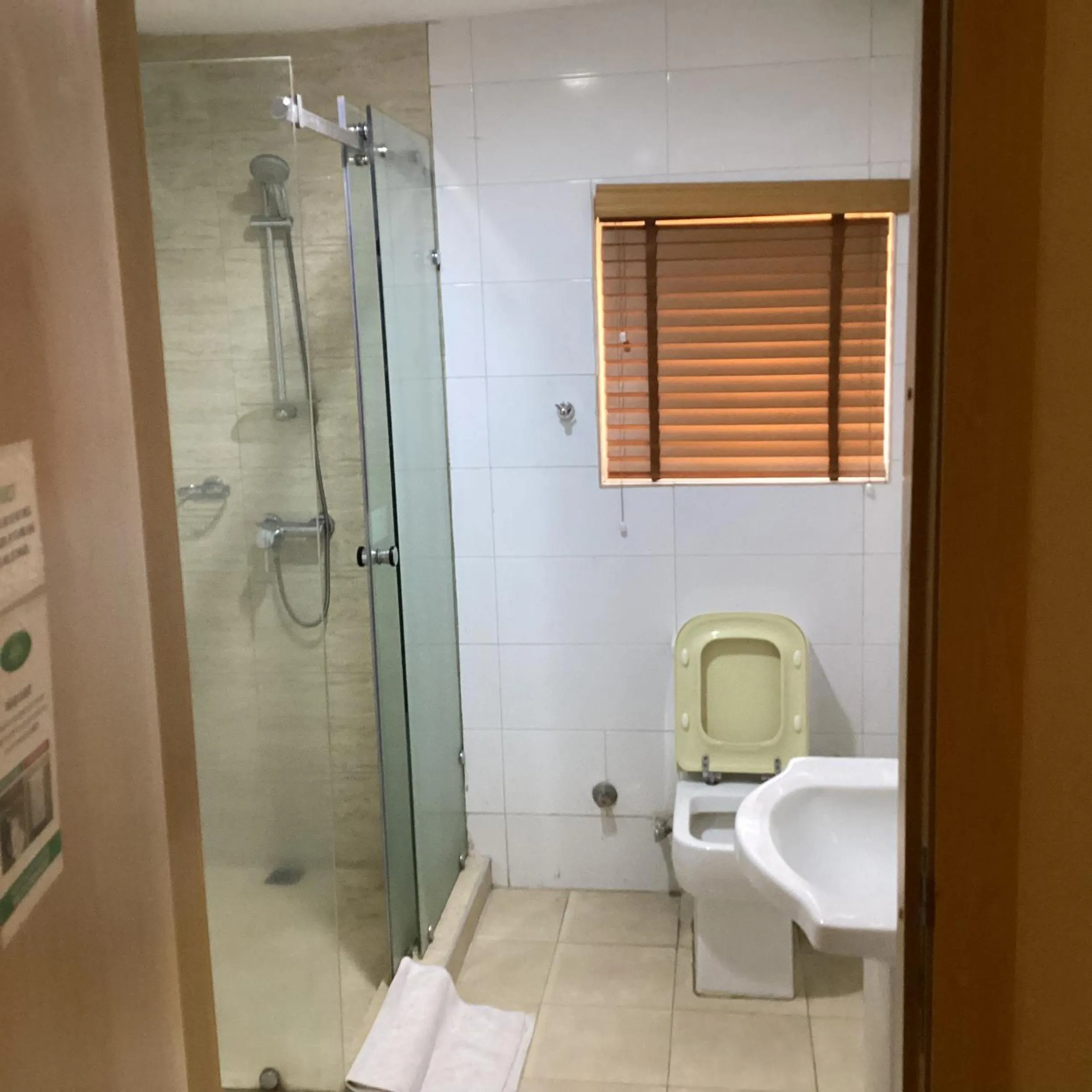 Shower in Adis Hotels Ibadan