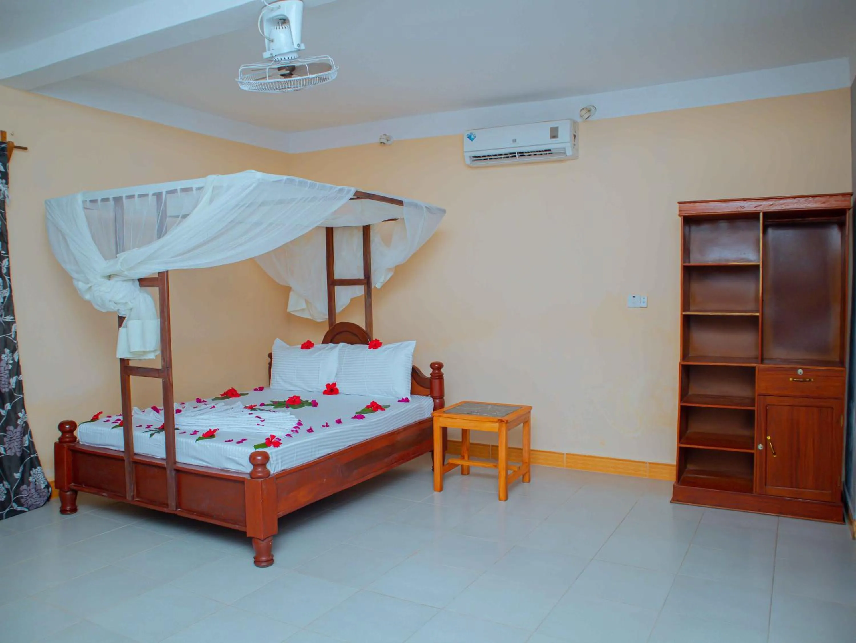 Bed in Tumaini Bungalows
