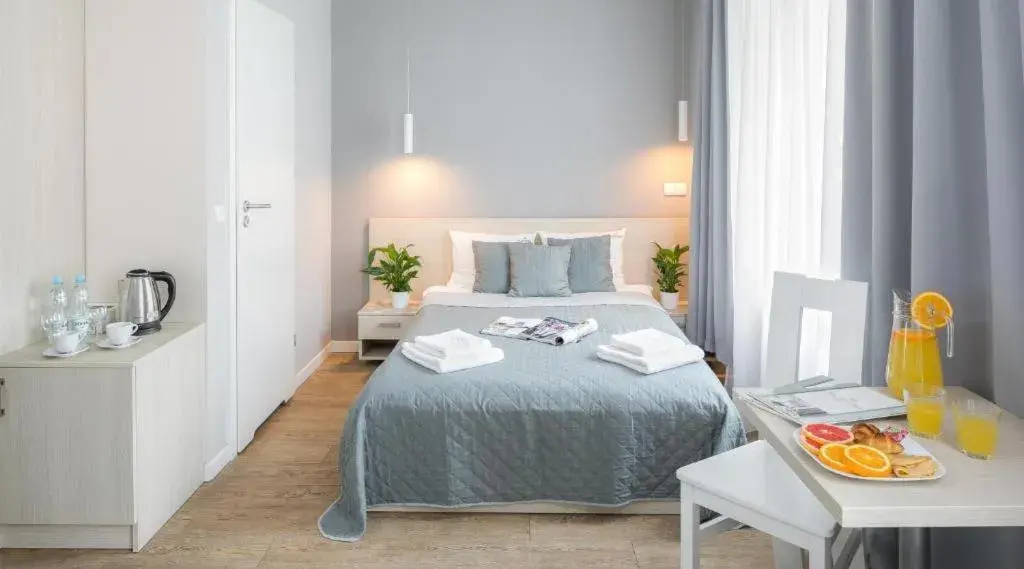 Bed in Apartamenty Platinia - komfortowe noclegi Kraków Stare Miasto Bed in Apartamenty Platinia - komfortowe noclegi Kraków Stare Miasto