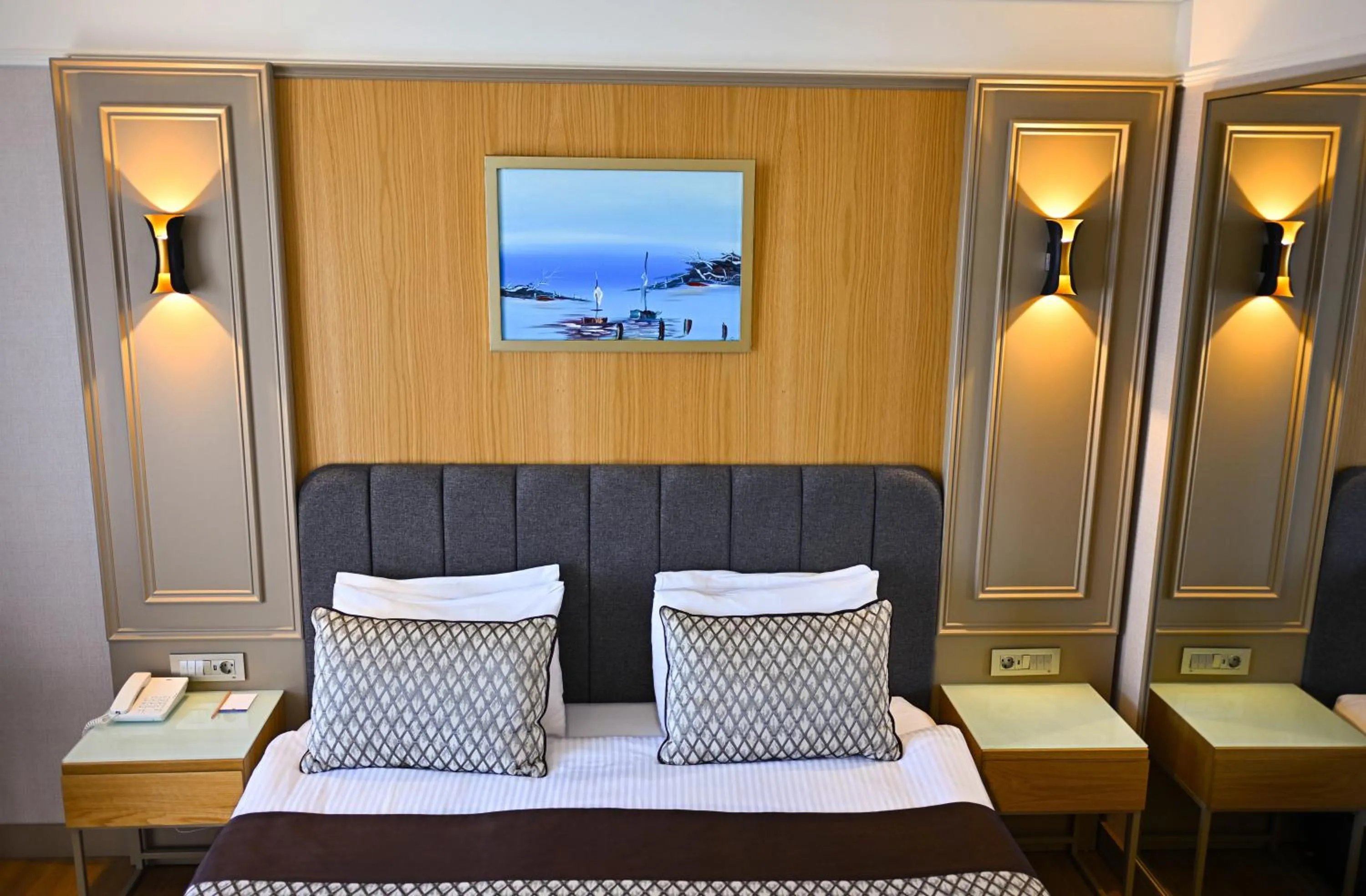 Bed in Porto Bello Hotel Resort & Spa