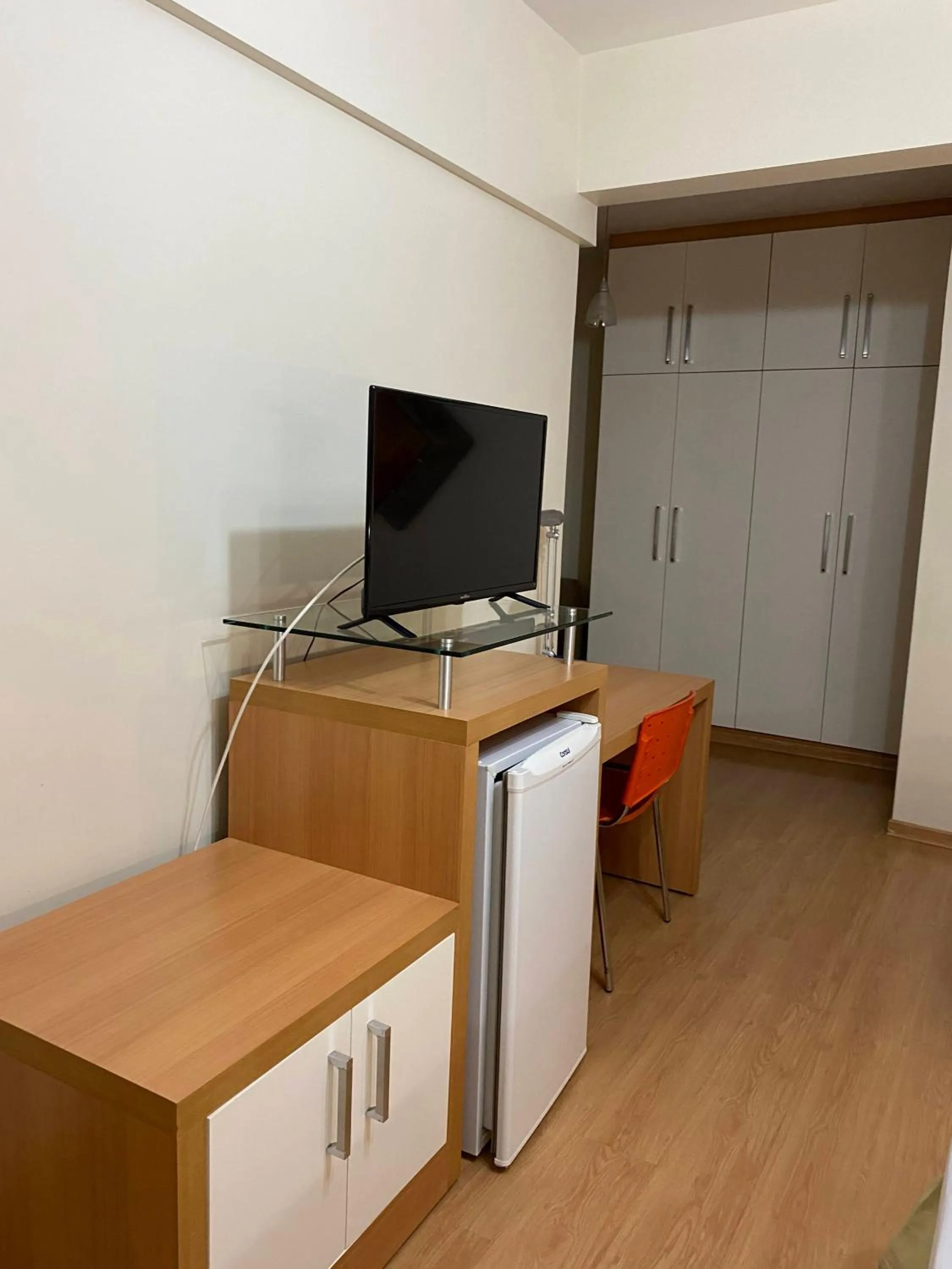 Communal lounge/ TV room in Líber Hotel Nova Serrana - Conforto na Rota da BR-262