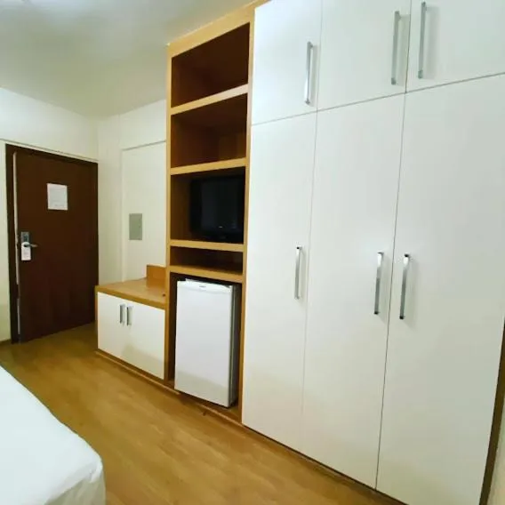 wardrobe, Bed in Líber Hotel Nova Serrana - Conforto na Rota da BR-262