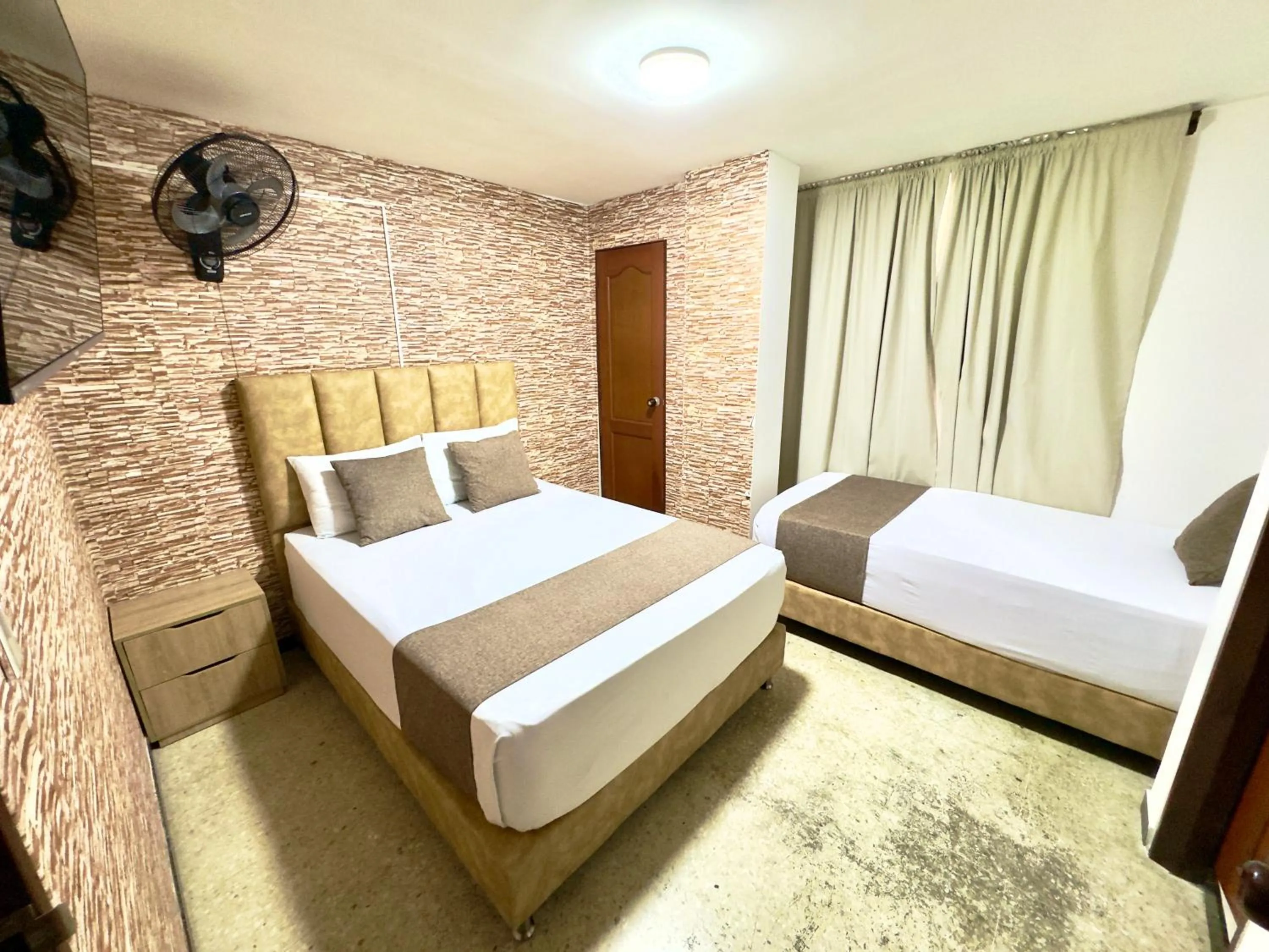 Bed in Hotel Pereira Central