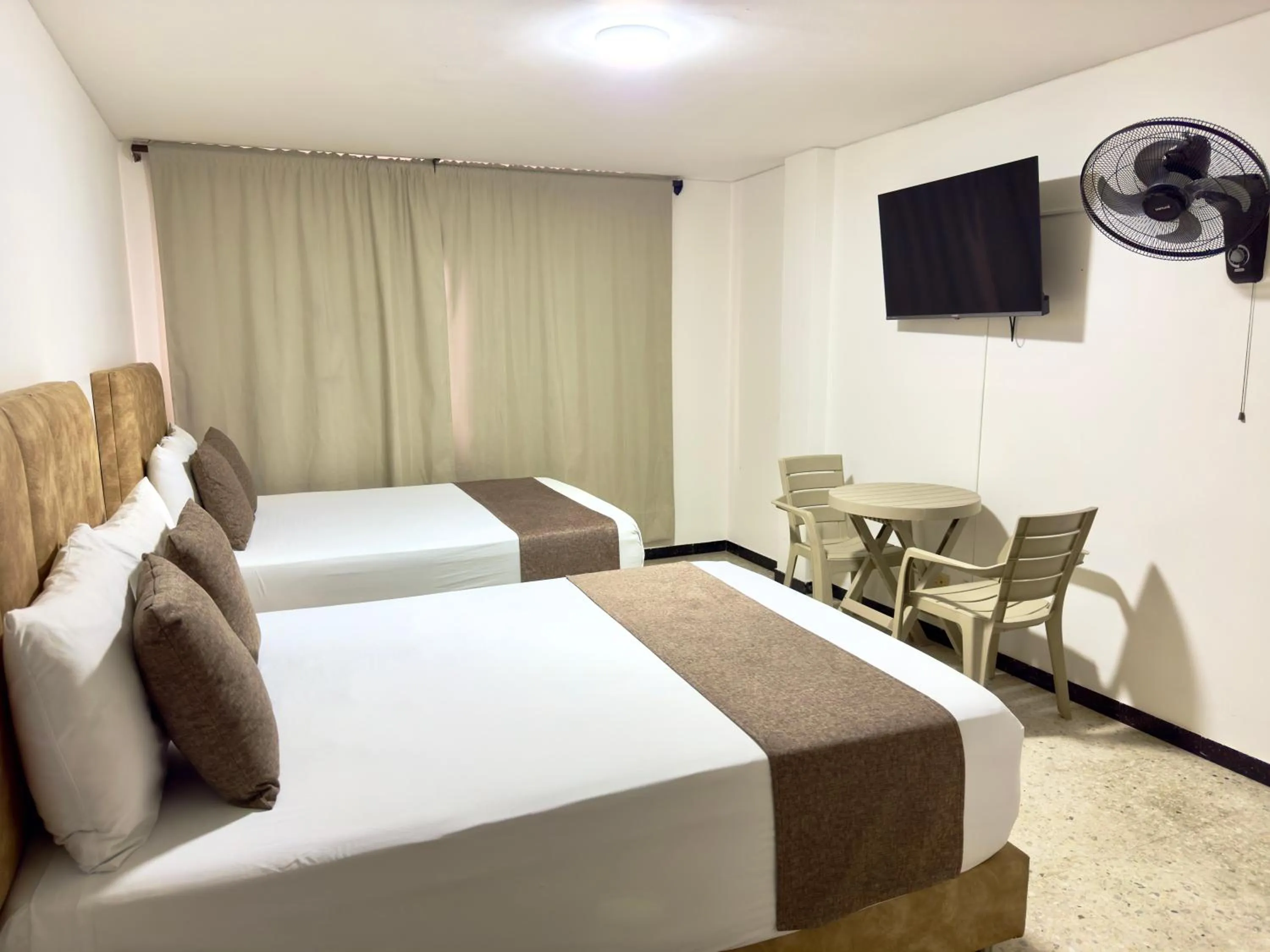 Bed in Hotel Pereira Central