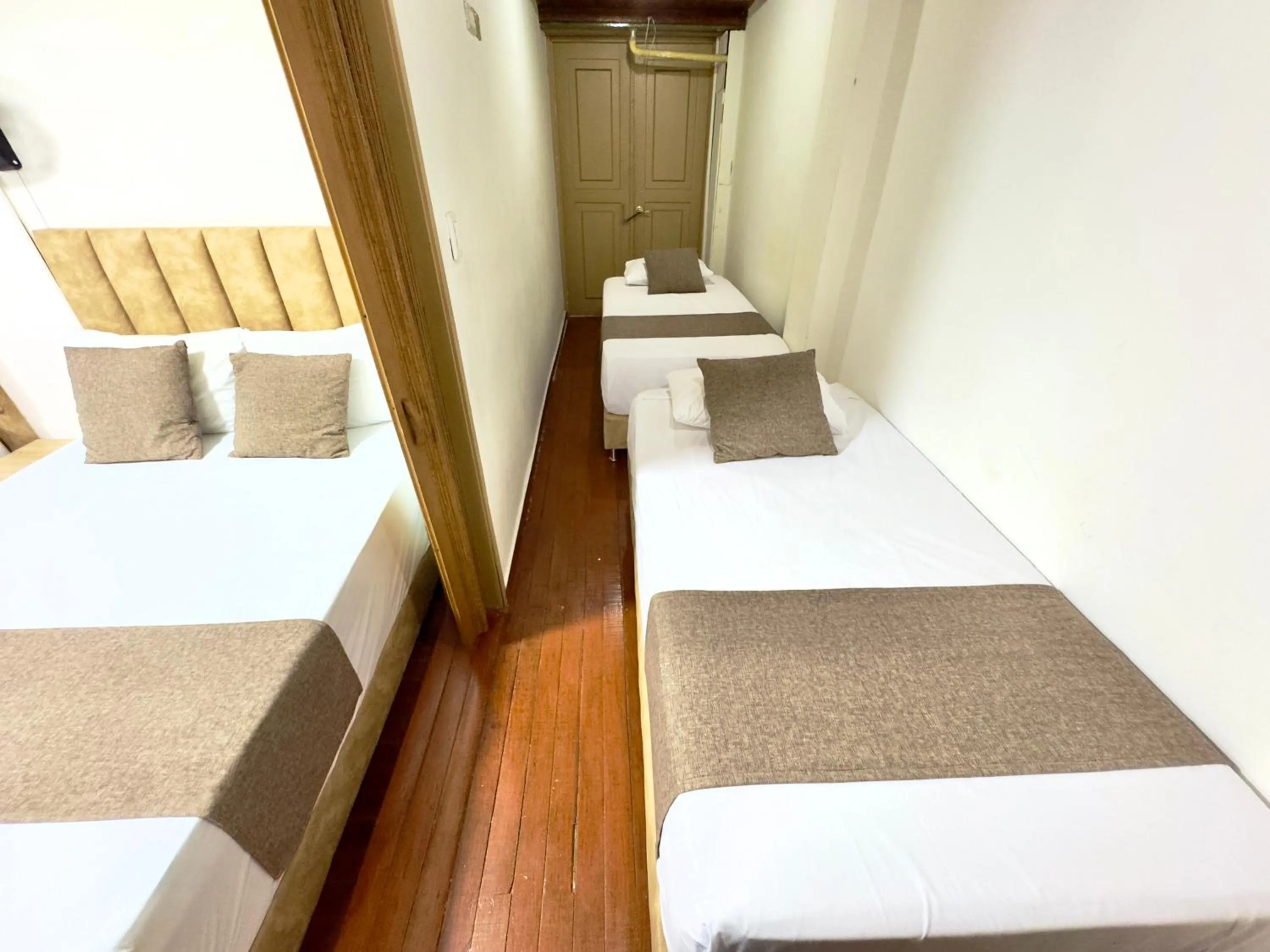 Bed in Hotel Pereira Central