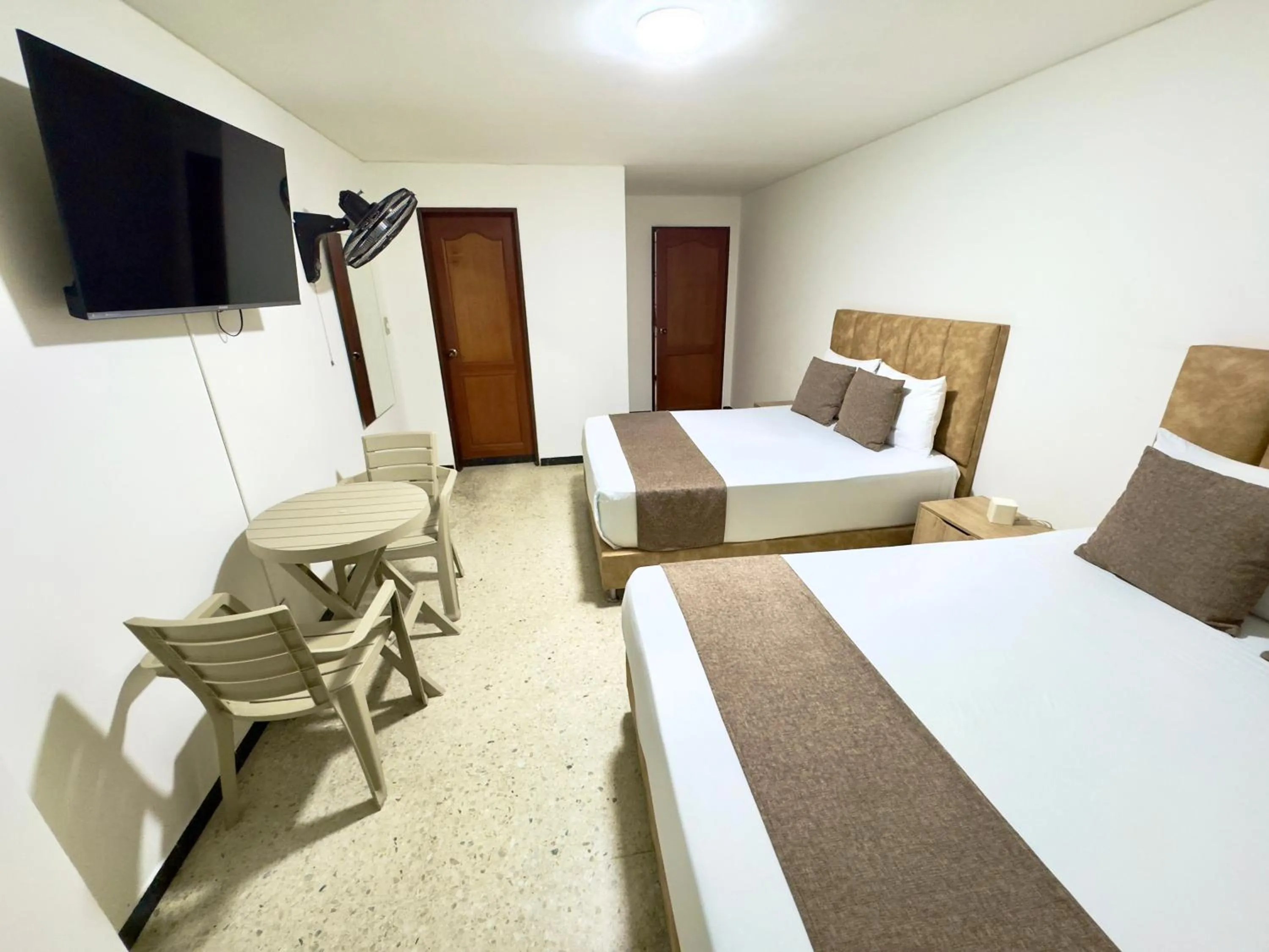 Bed in Hotel Pereira Central