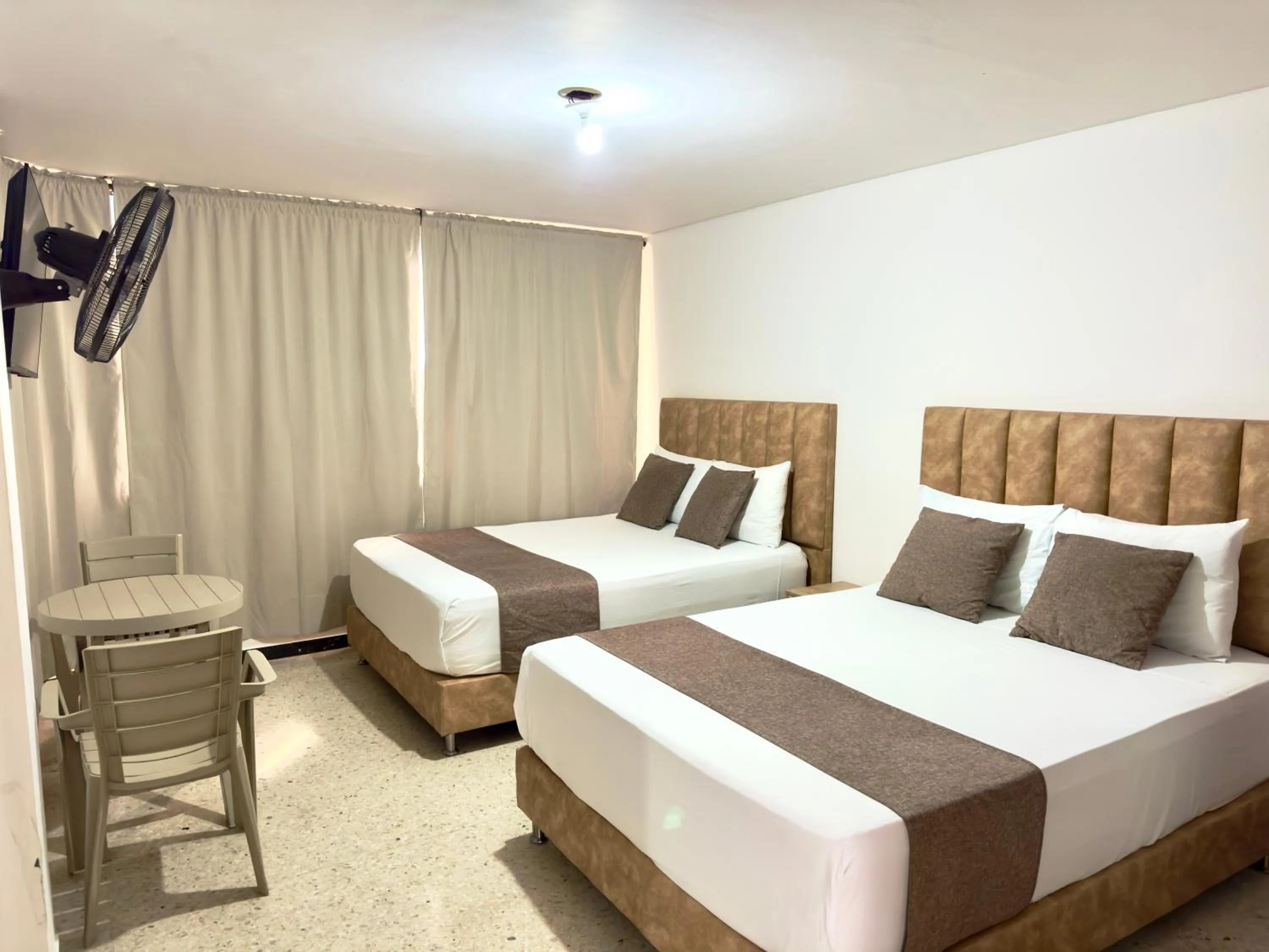 Bed in Hotel Pereira Central