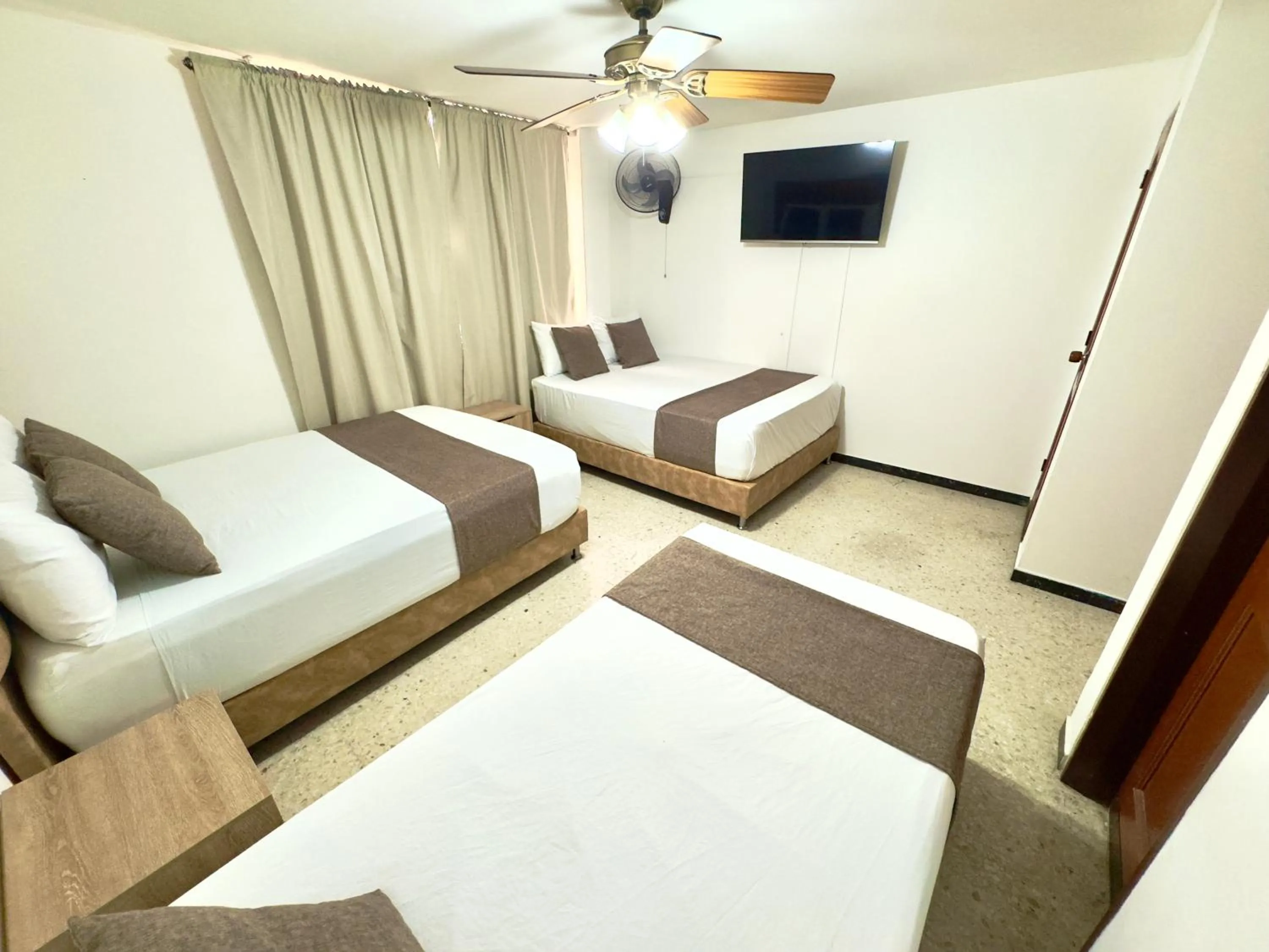 Bed in Hotel Pereira Central