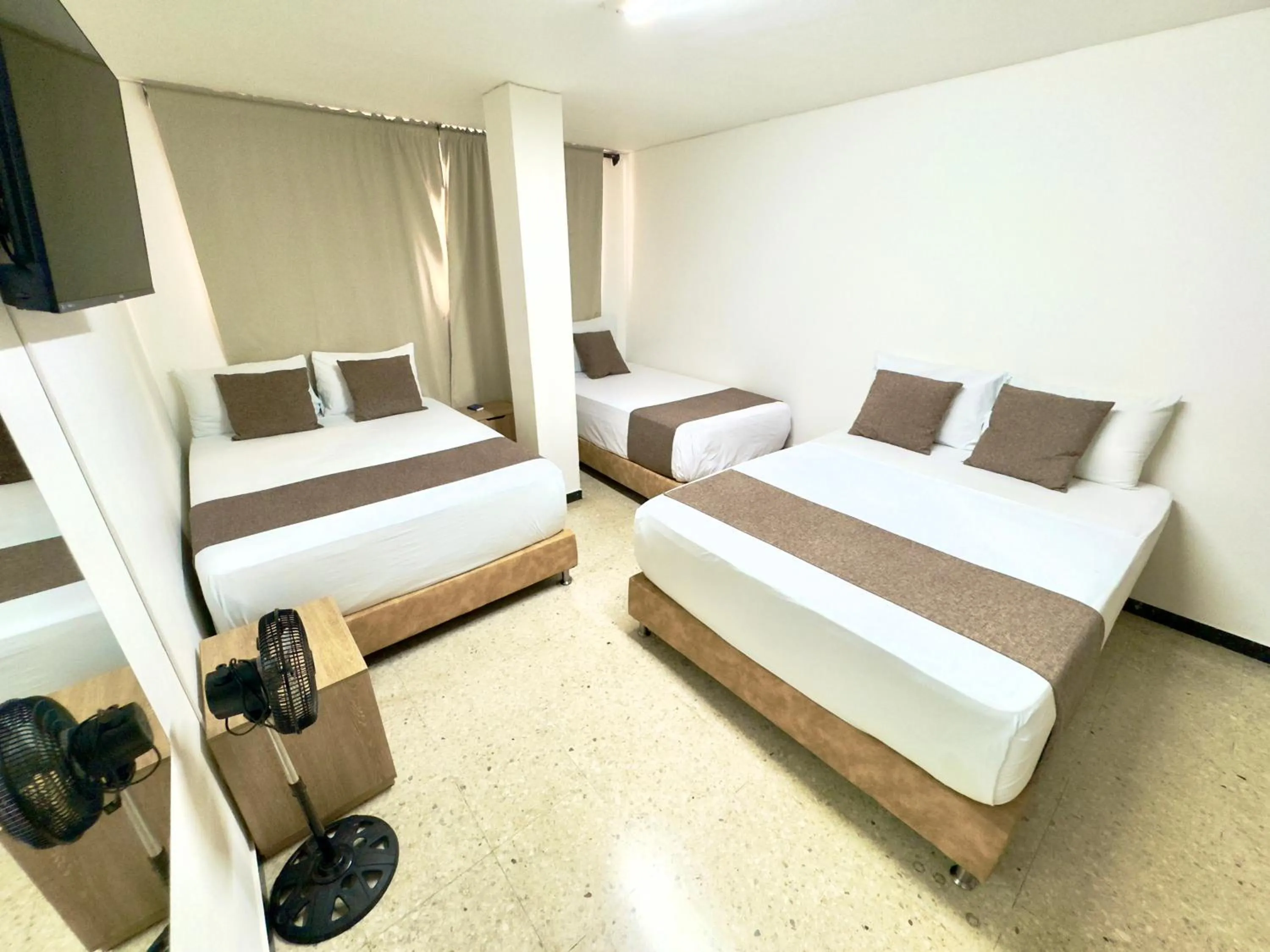 Bed in Hotel Pereira Central