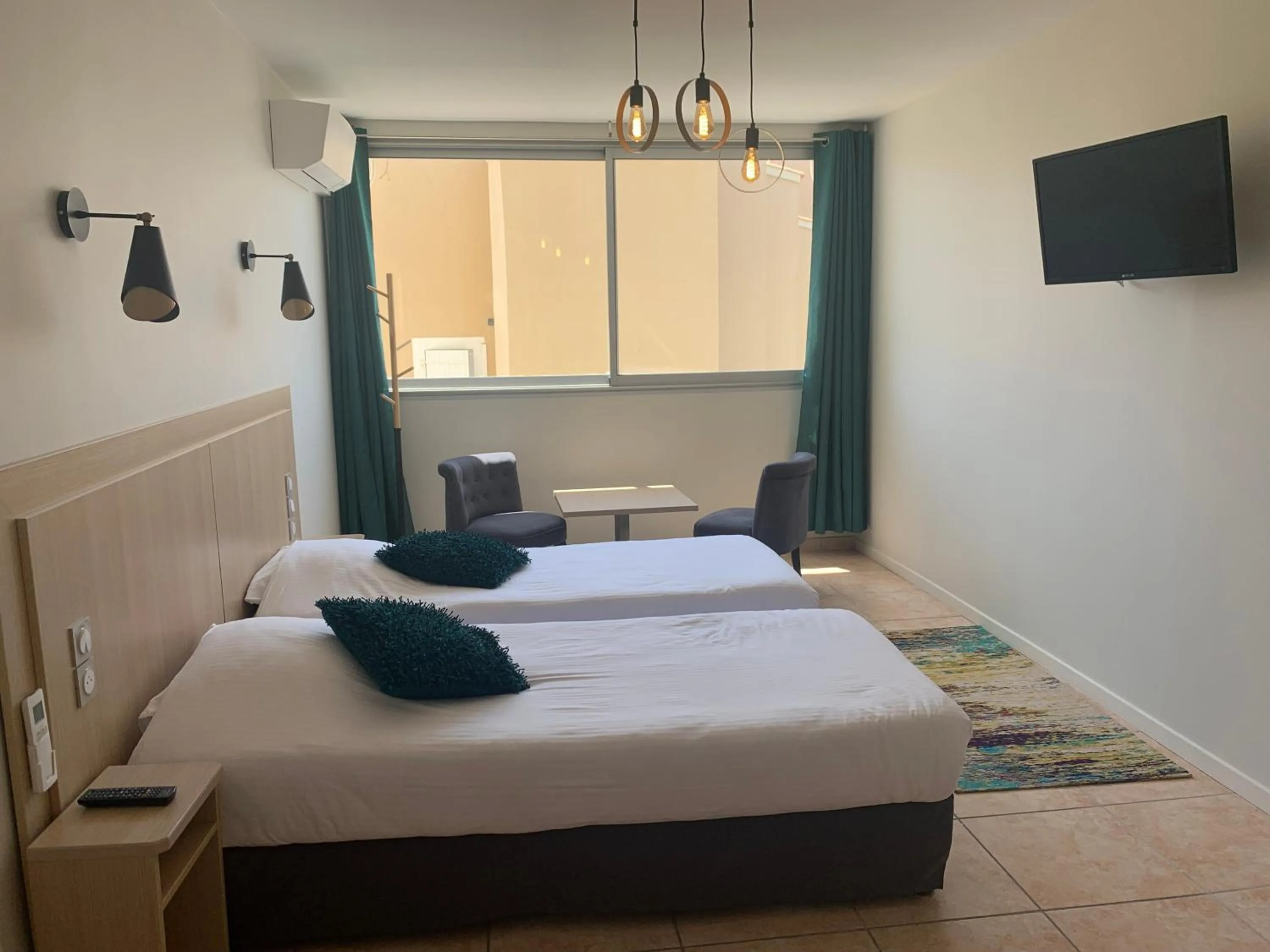 Photo of the whole room, Bed in Hôtel La Grande Conque