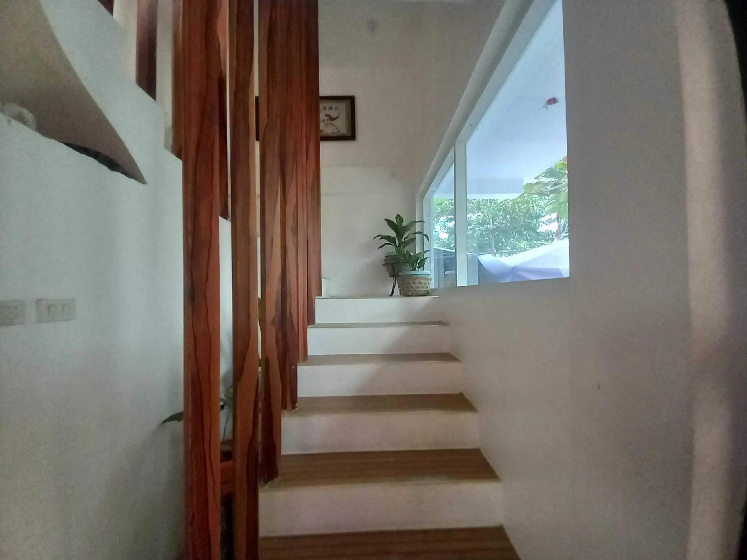 Bedroom in OYO 1130 Thrivers Hometel