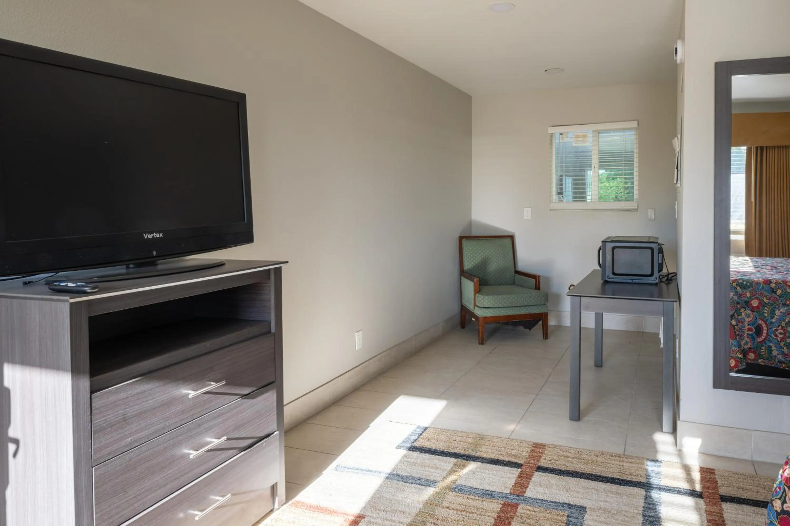 Seating area in Motel 7 By OYO Near Phoenix Airport