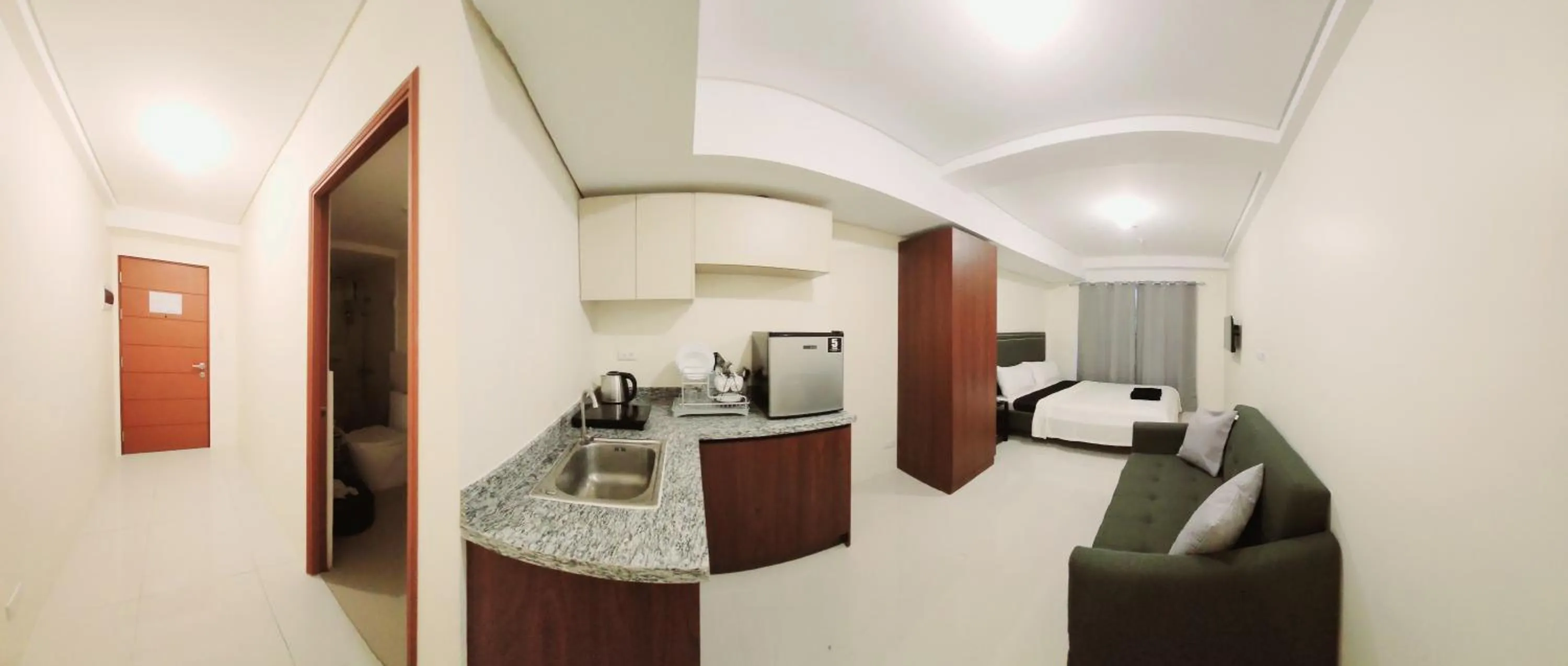 Bed in Selendra-Baguio City Suites