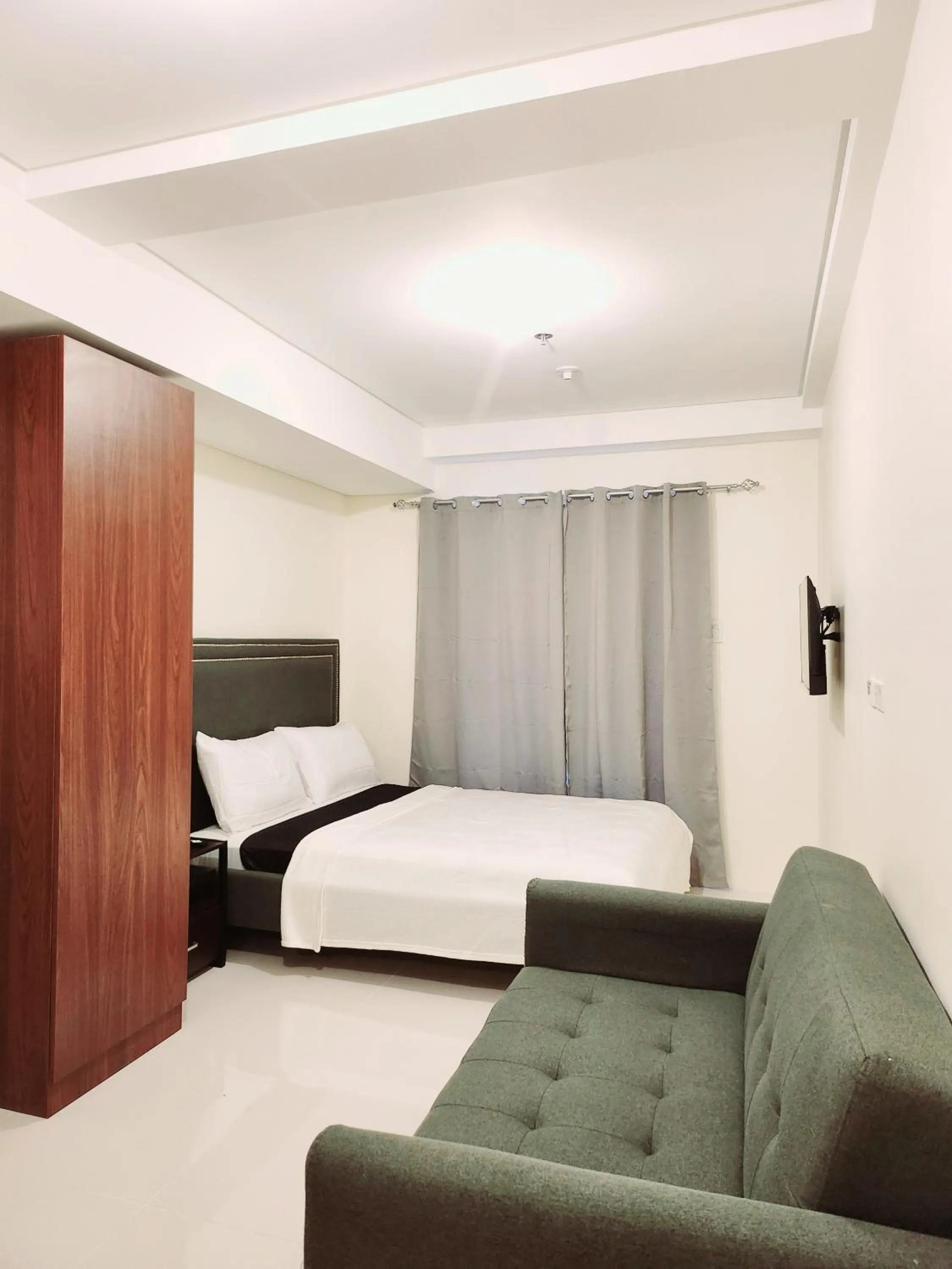 Bed in Selendra-Baguio City Suites