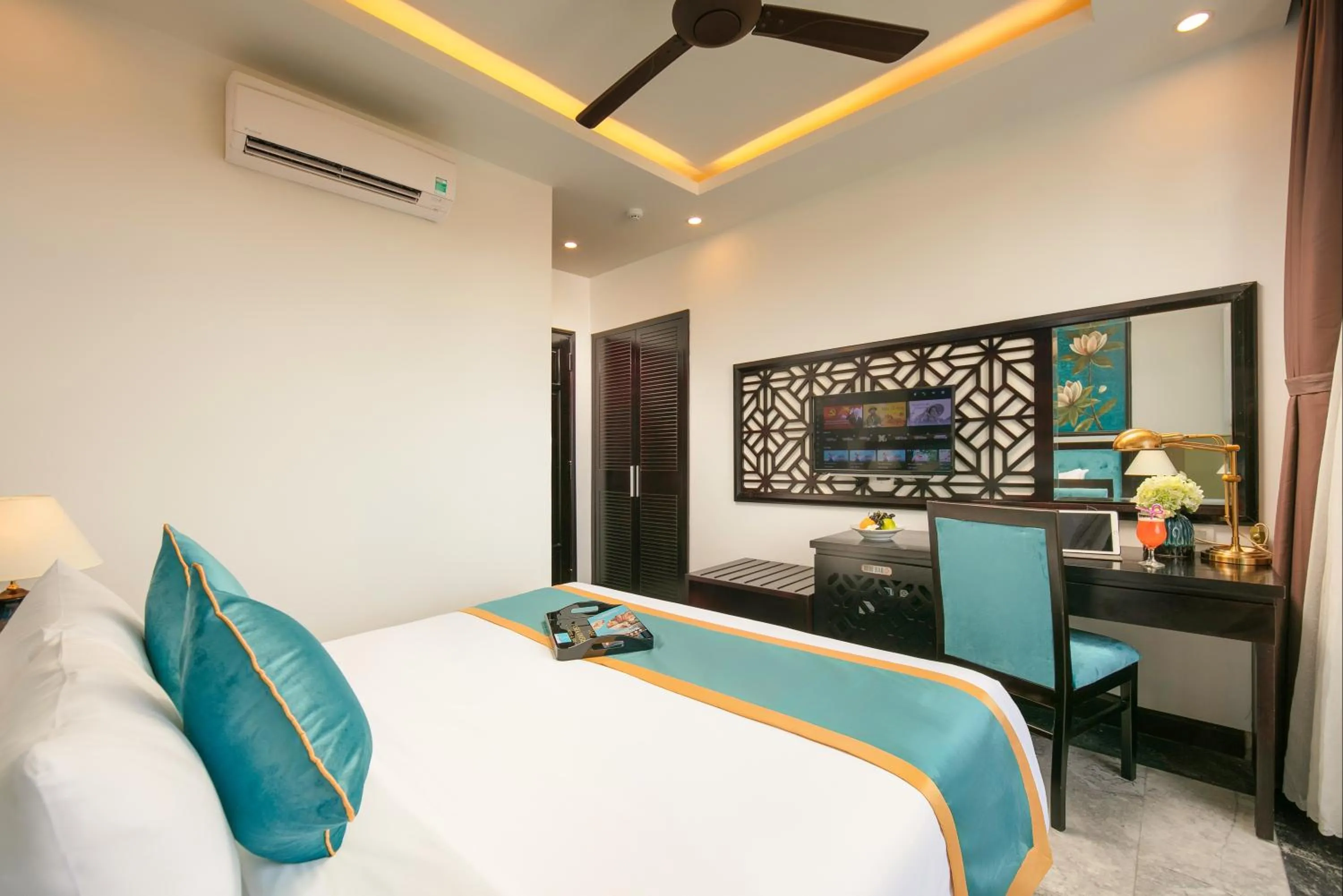 Photo of the whole room, Bed in Silk River Hoi An Hotel & Spa