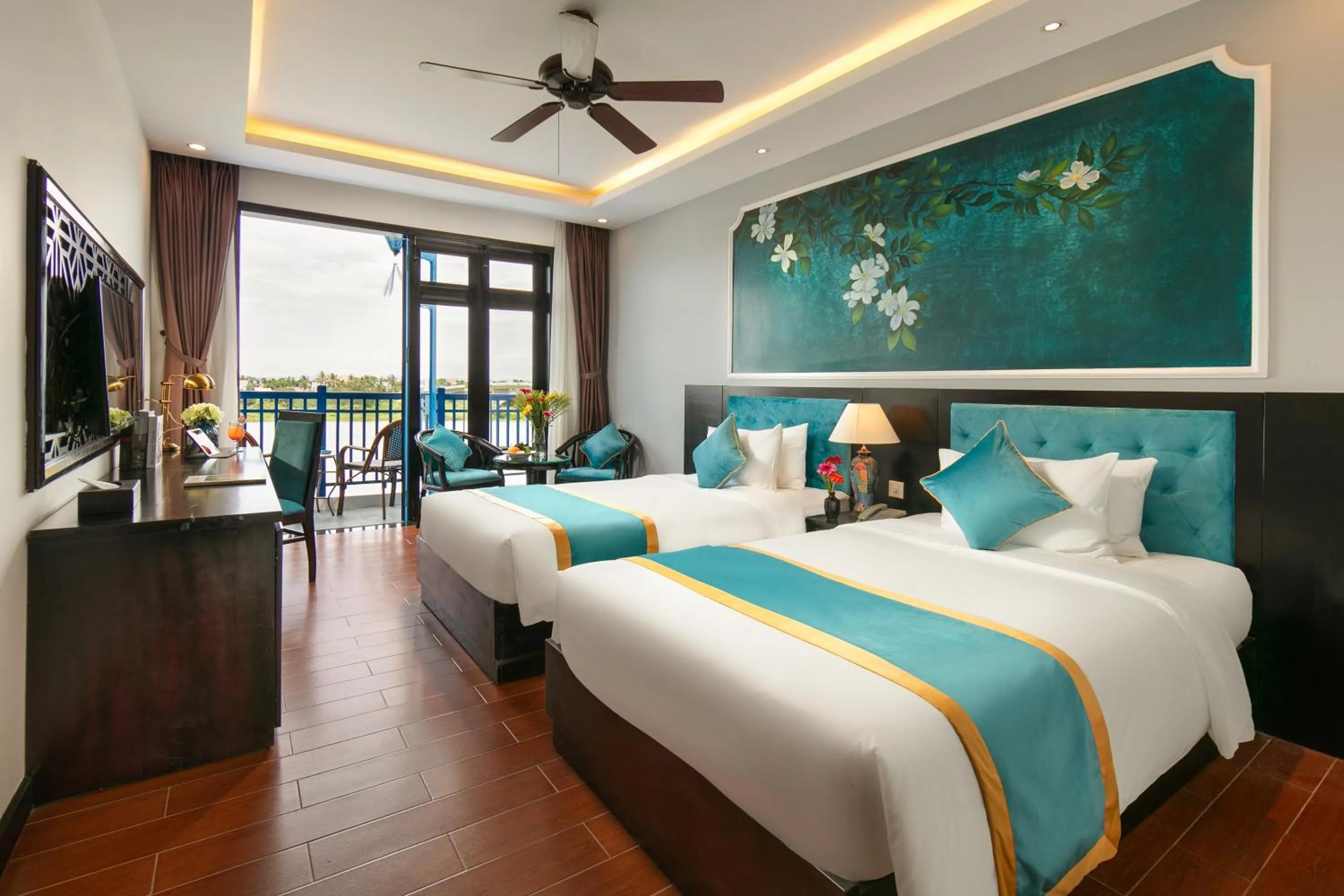 Bed in Silk River Hoi An Hotel & Spa