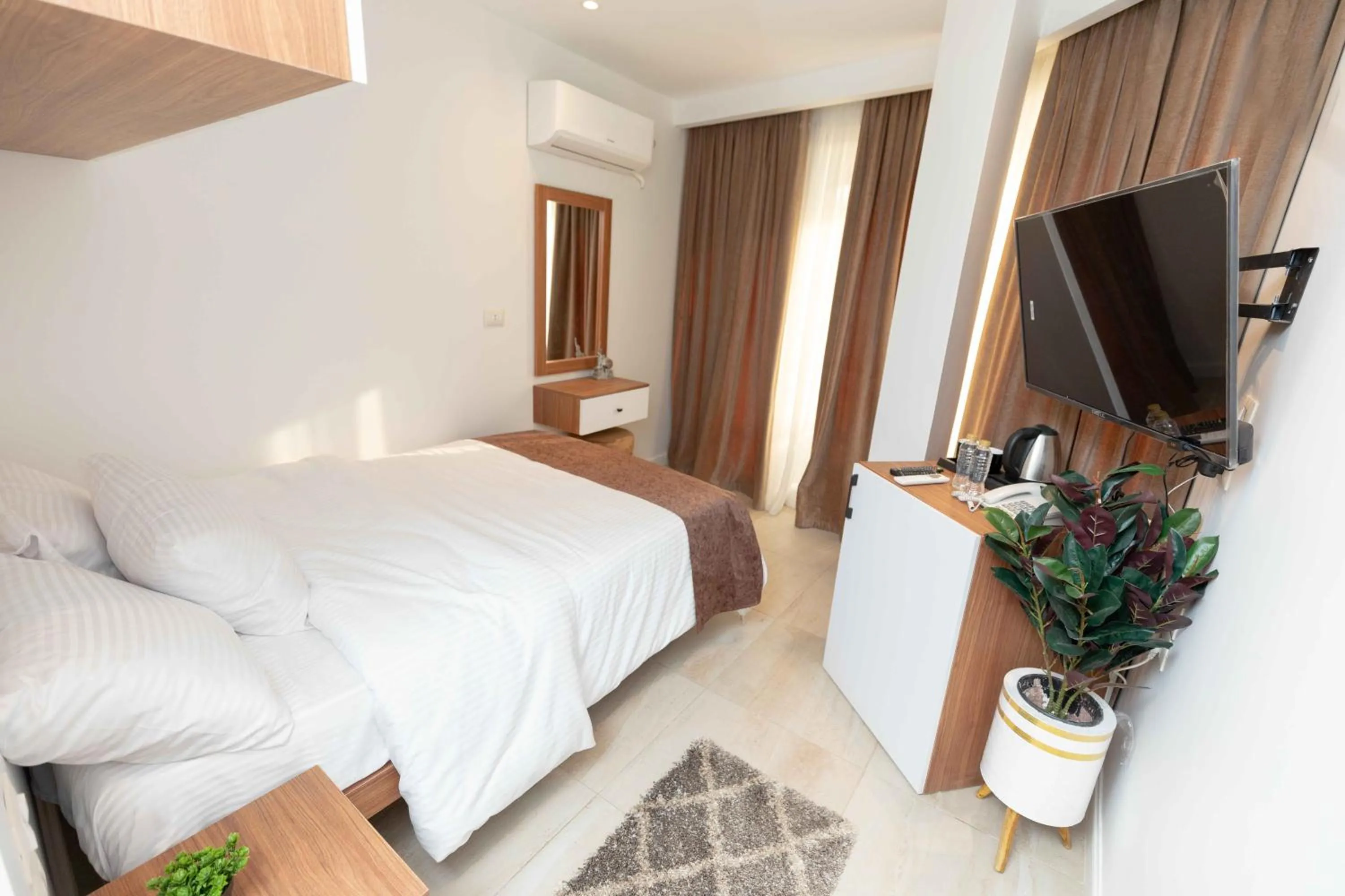 Bed in Eyes Of Egypt Pyramids View Boutique Hotel