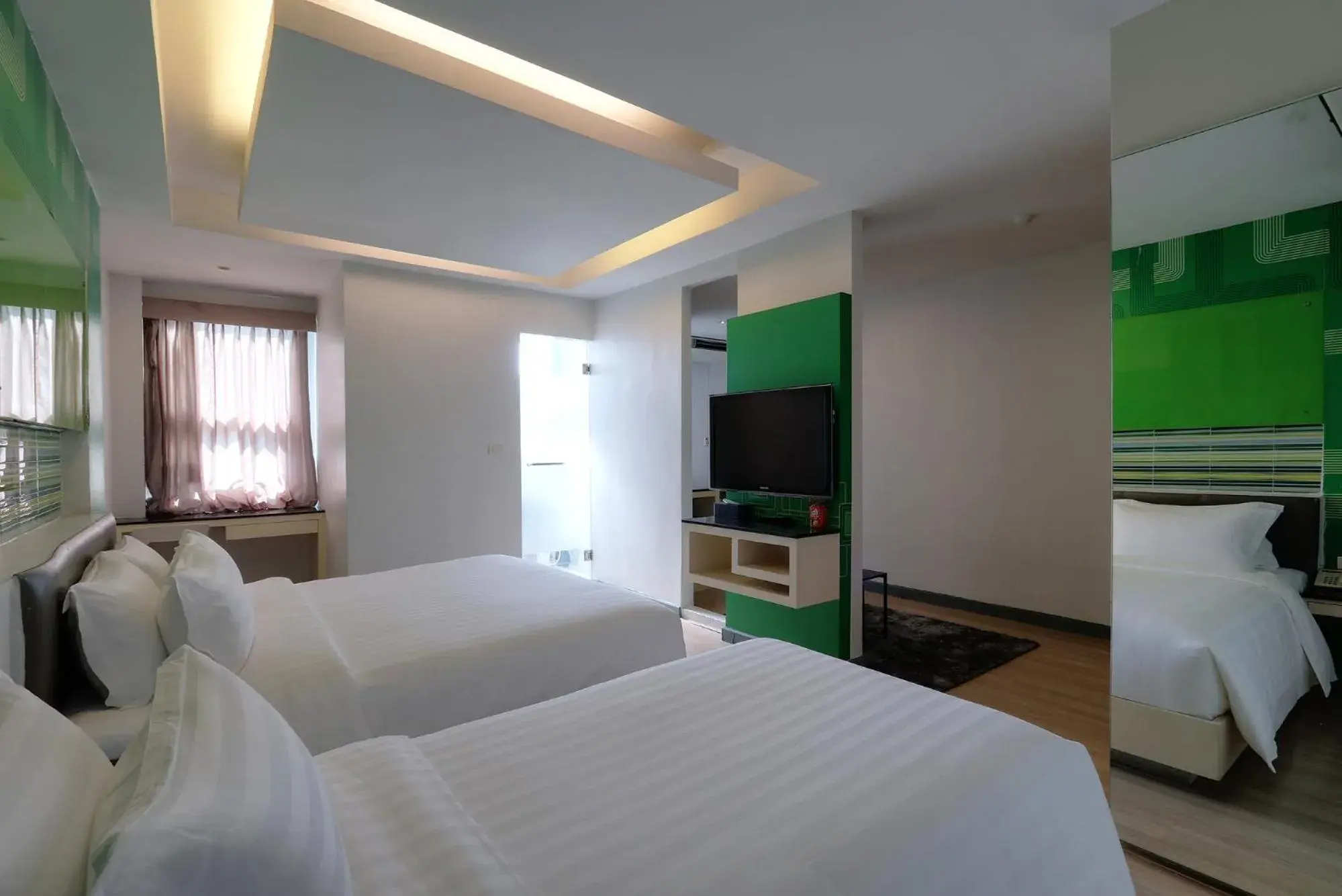 Photo of the whole room, Bed in Klassique Sukhumvit Hotel Photo of the whole room, Bed in Klassique Sukhumvit Hotel