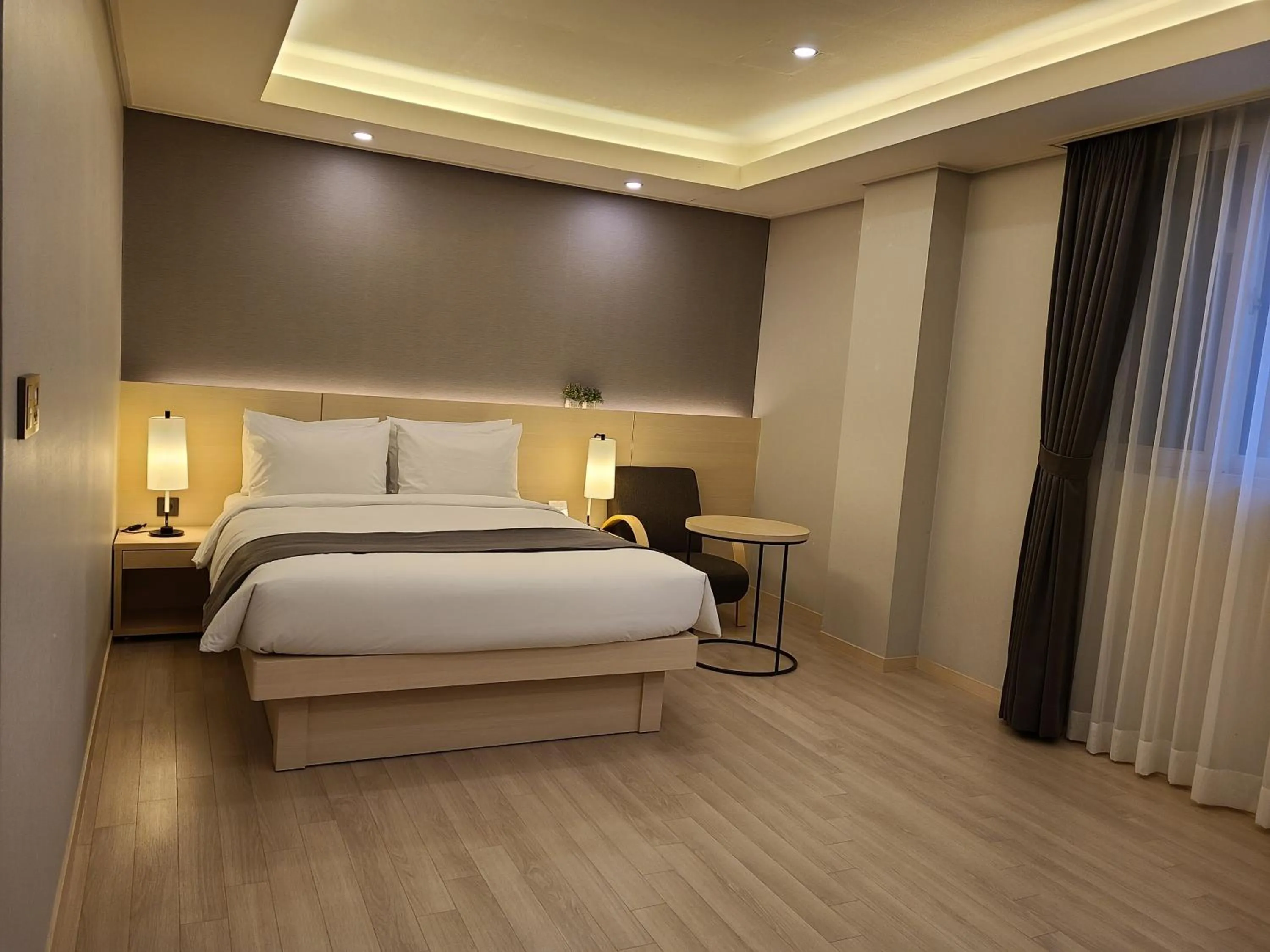 Bed in New Donghae Tourist Hotel