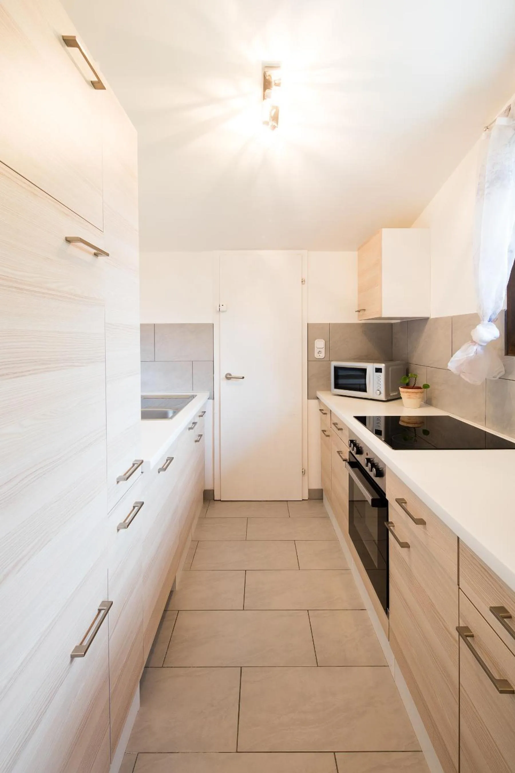 Kitchen or kitchenette in W & S Executive Apartments - Hallstatt I