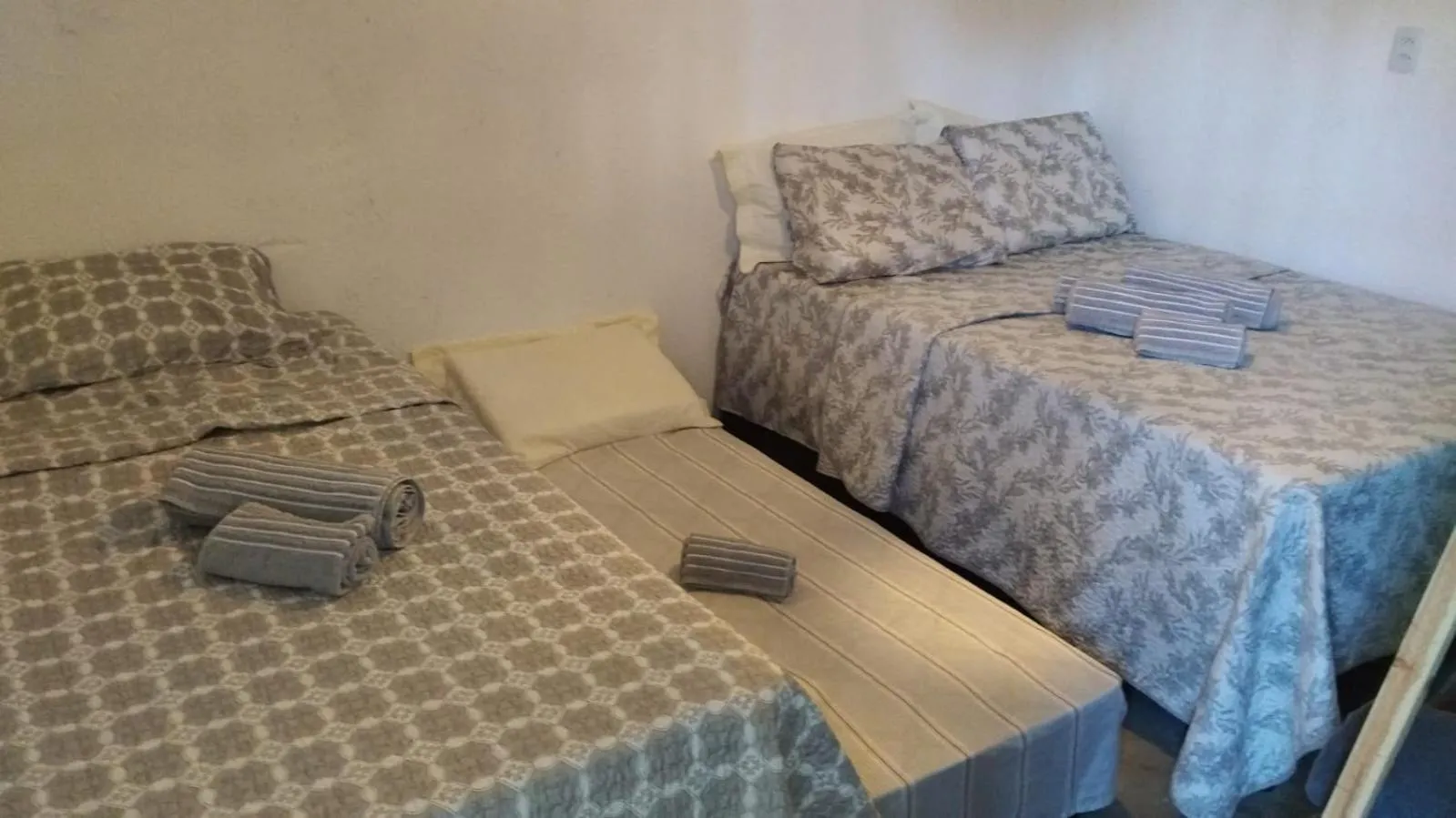 Photo of the whole room, Bed in Vila Malie milagres