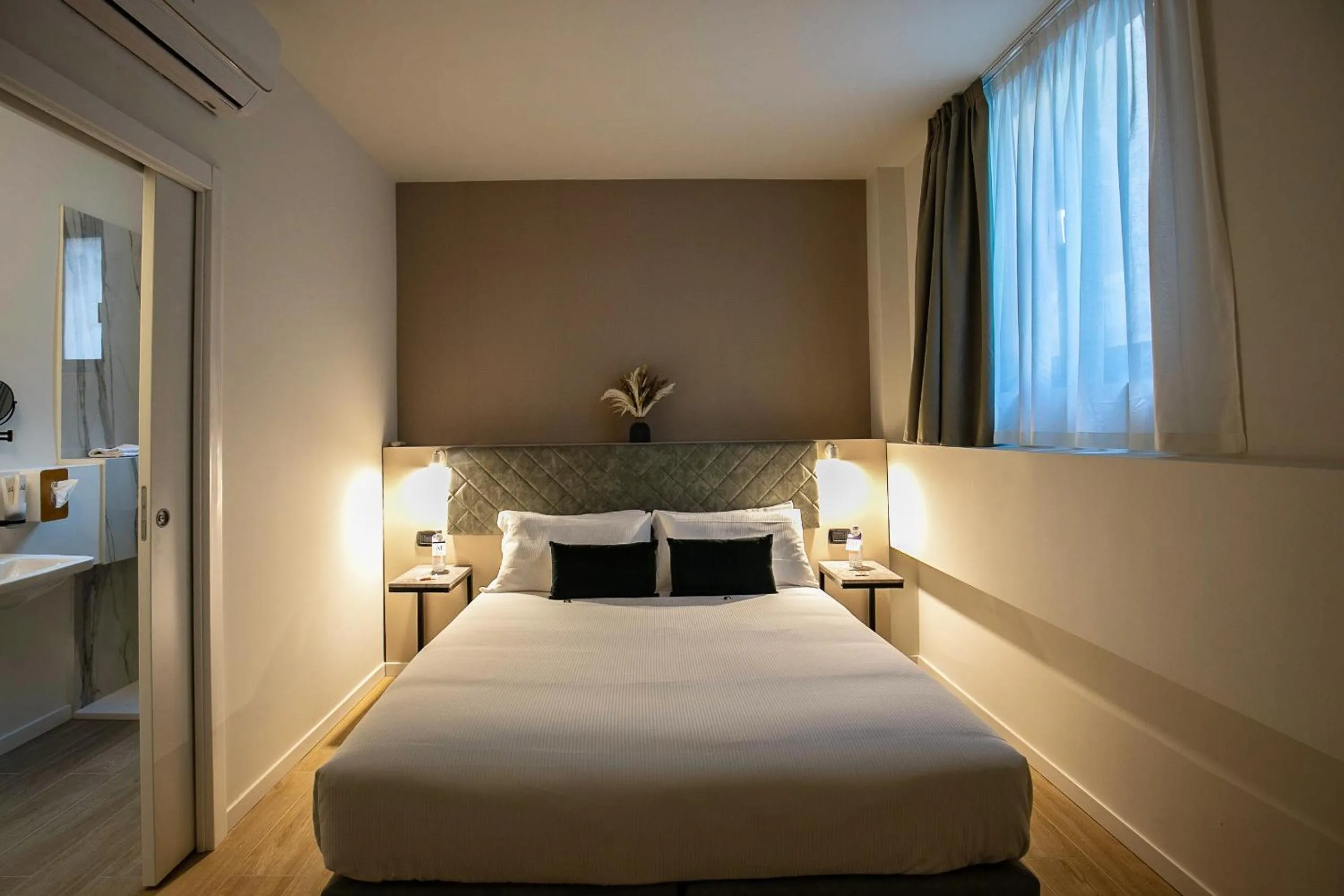 Bed in Aiello Hotels - CityLife Apartments
