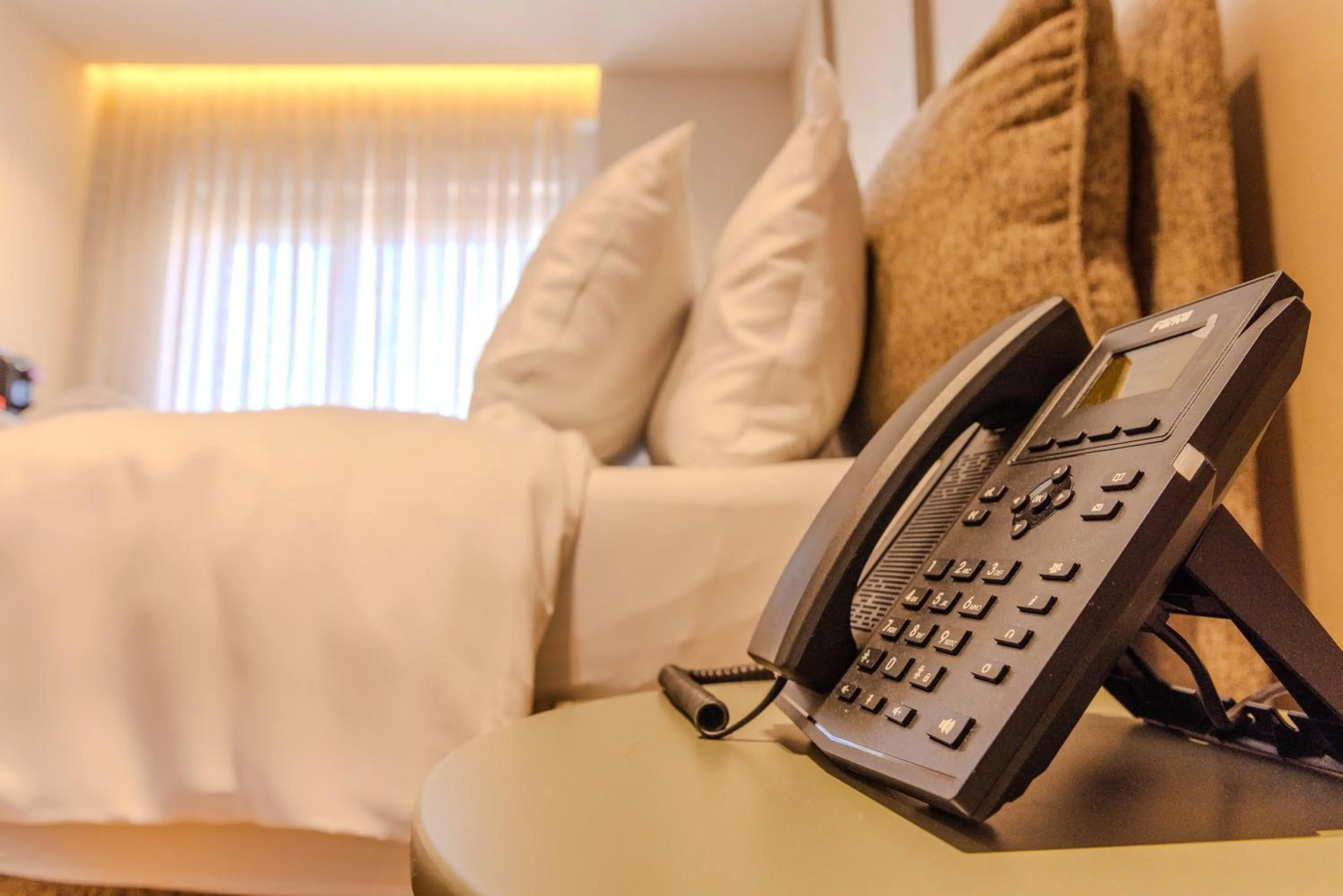 Bed in Si Hotel Tirana