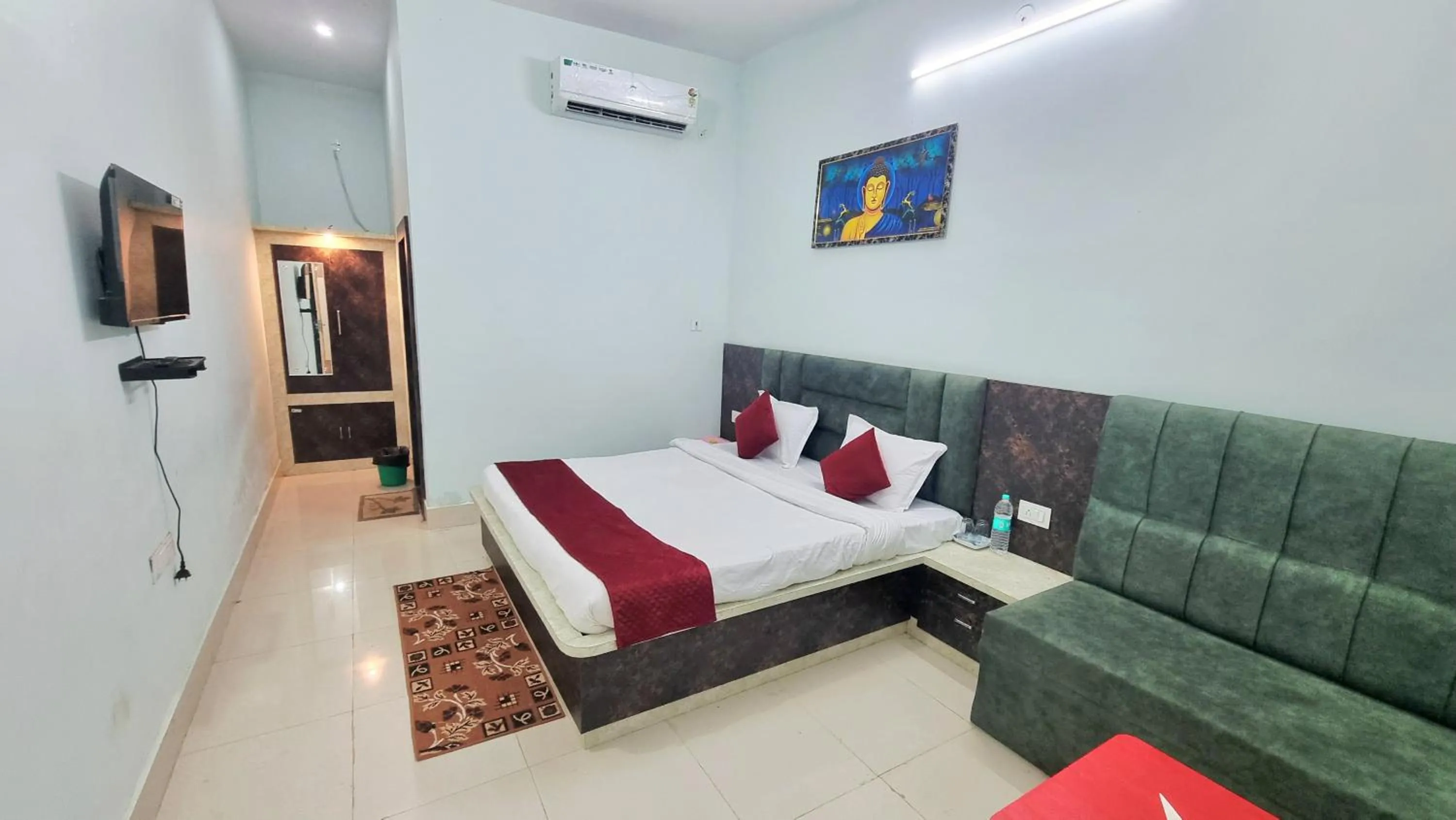 Bed in Hotel Vijay Greens