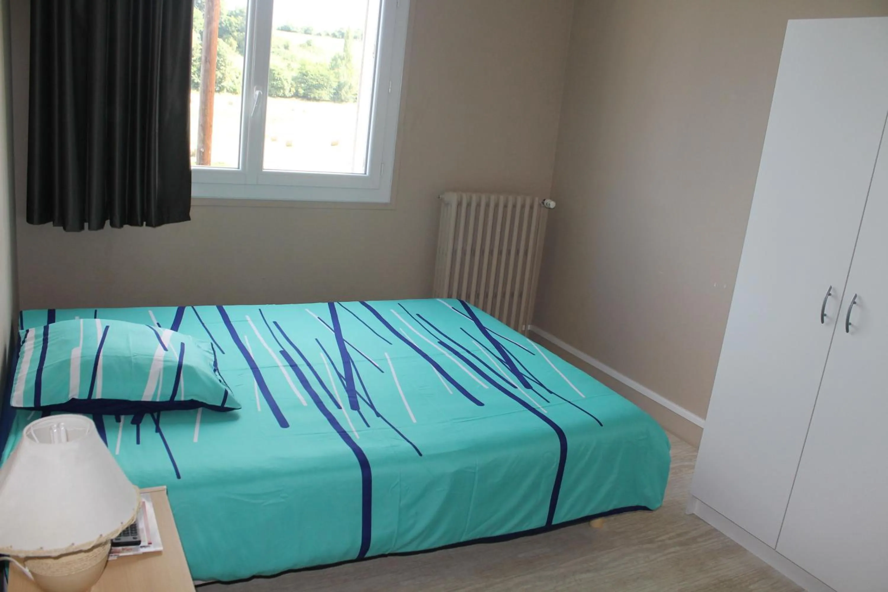 Bed in Le Bellevue Lisieux