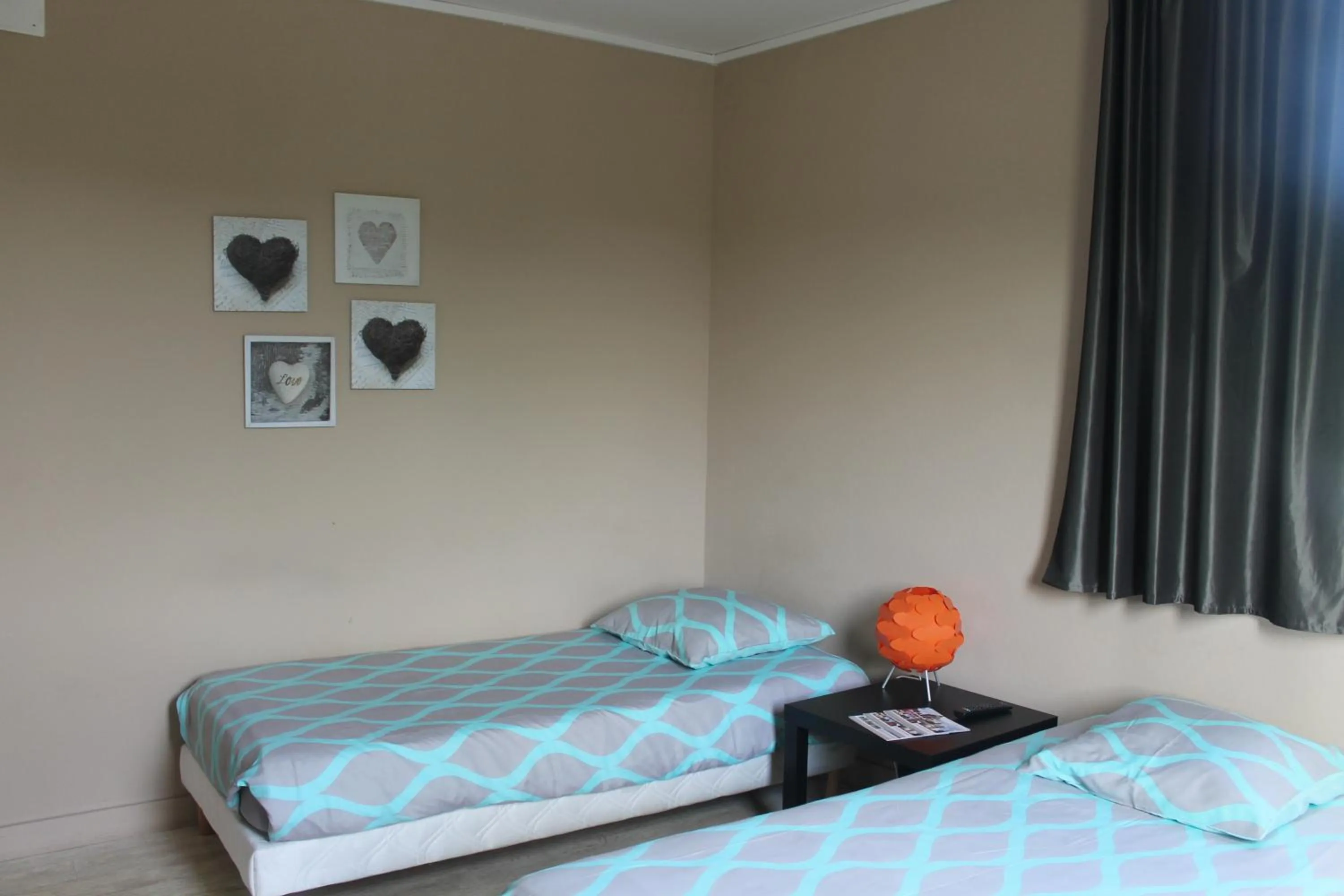 Bed in Le Bellevue Lisieux