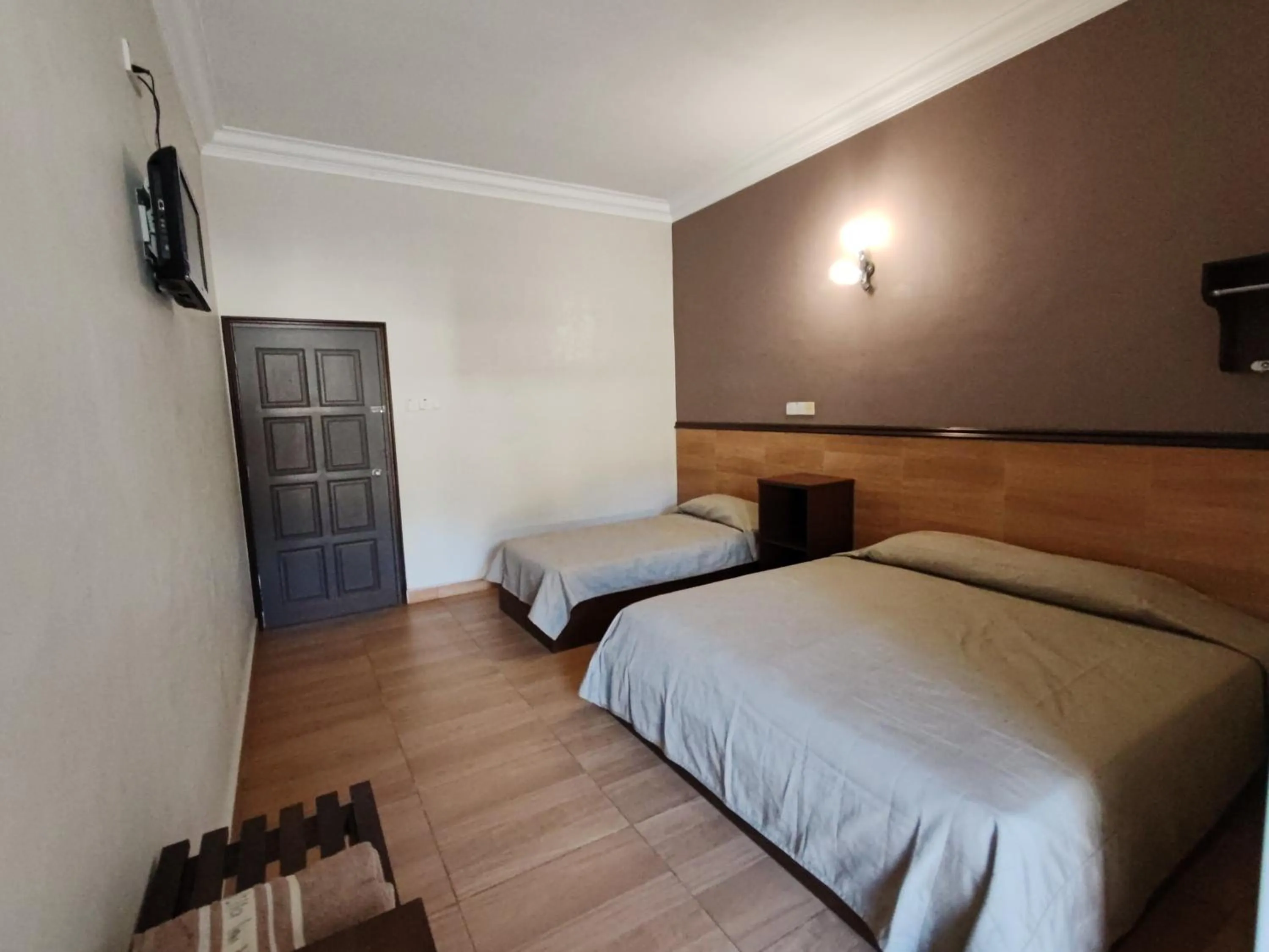 Bed in Lumut Villa Inn Homestay