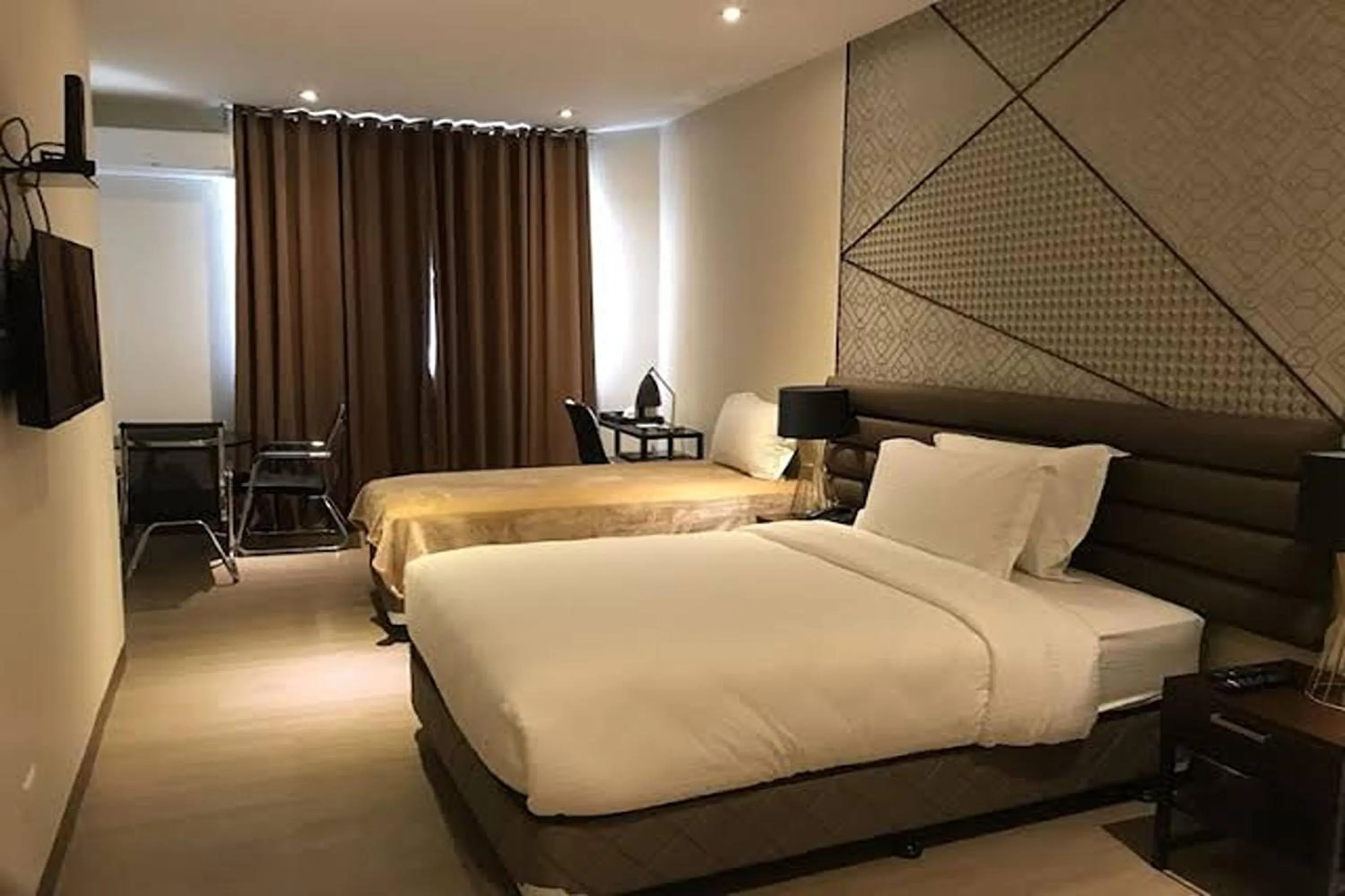 Bed in Maxx Hotel Ortigas