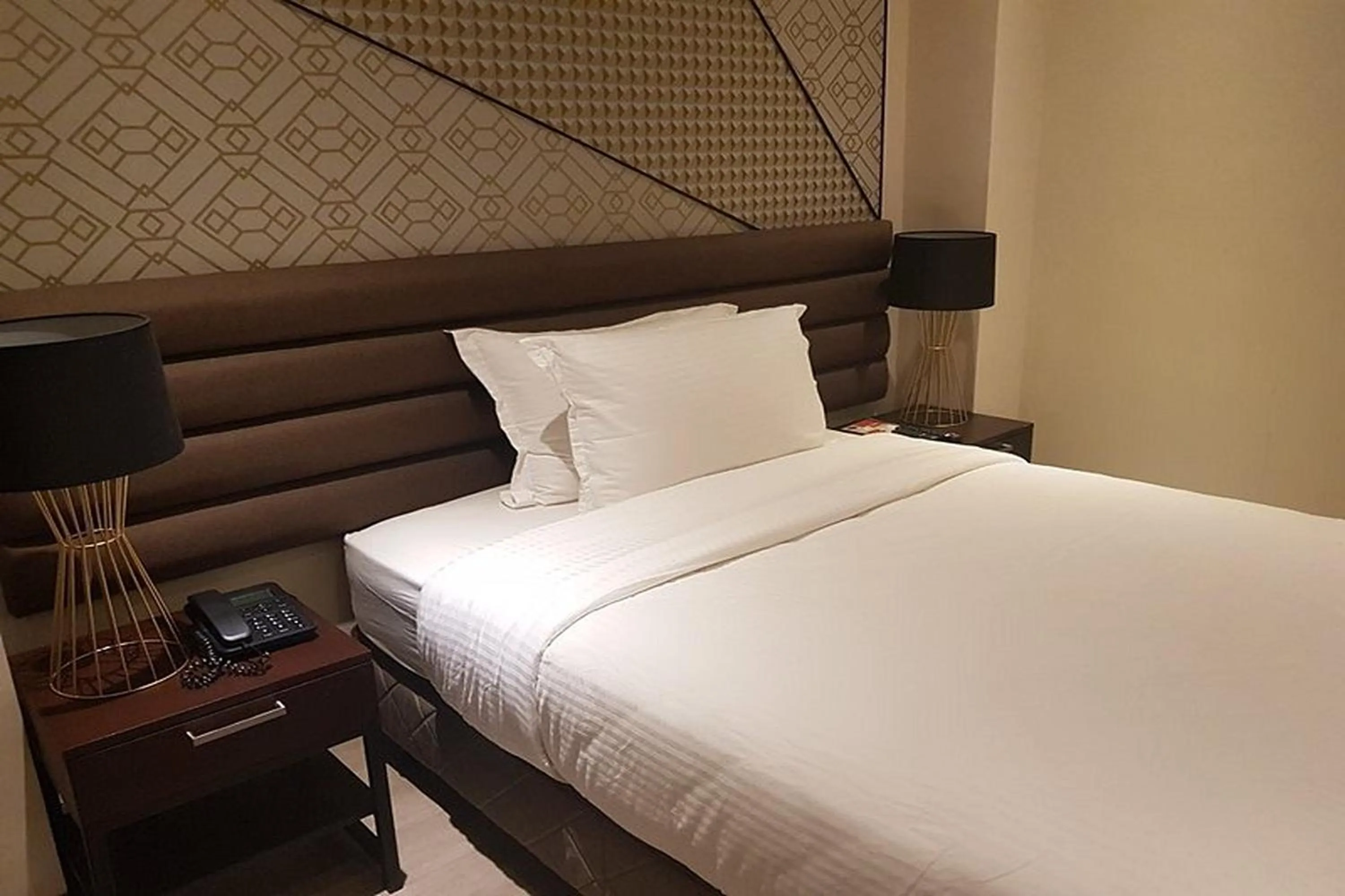 Bed in Maxx Hotel Ortigas