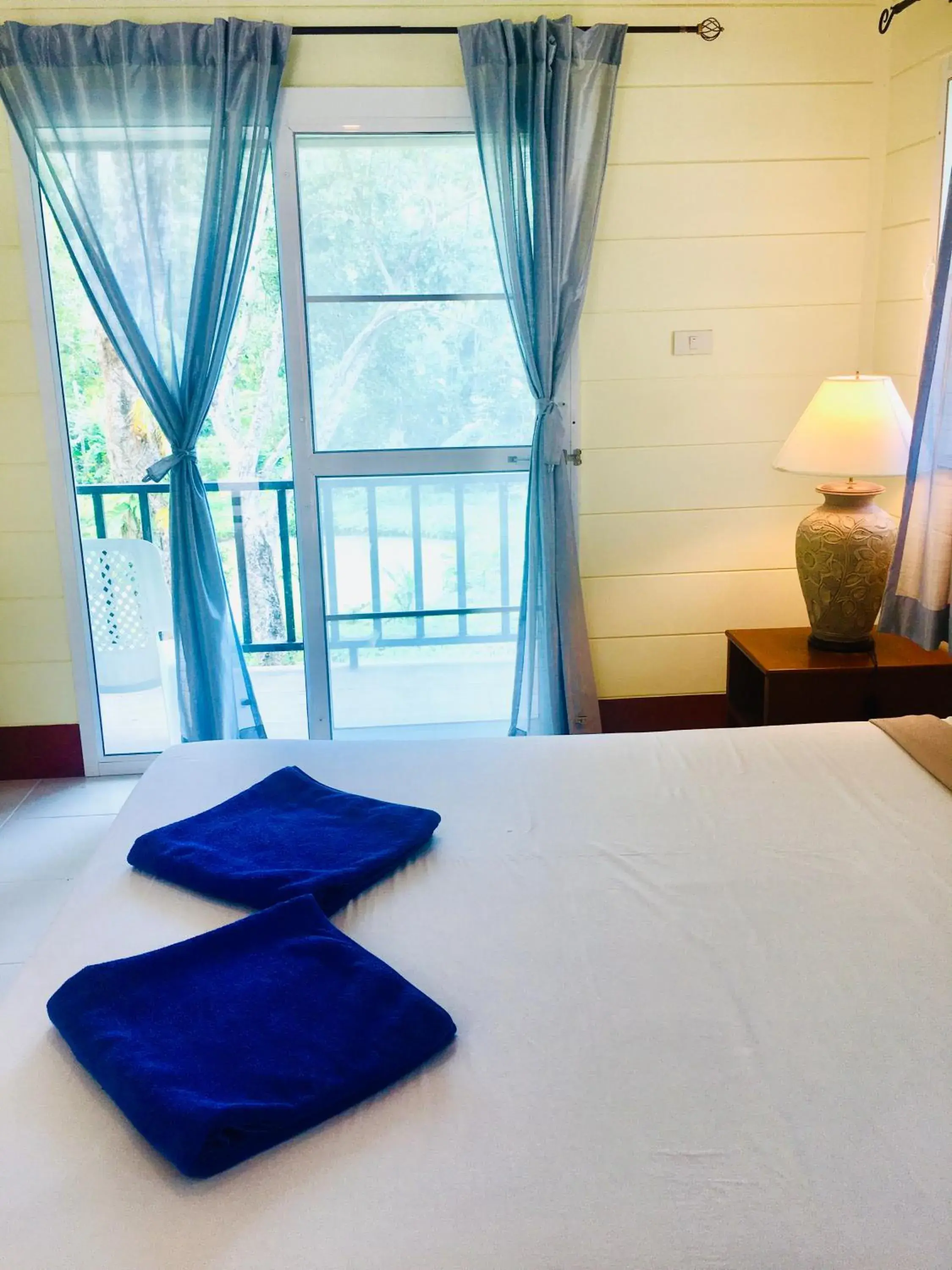 Bed in Mookies Bungalows Bed in Mookies Bungalows