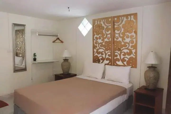 Bed in Mookies Bungalows Bed in Mookies Bungalows