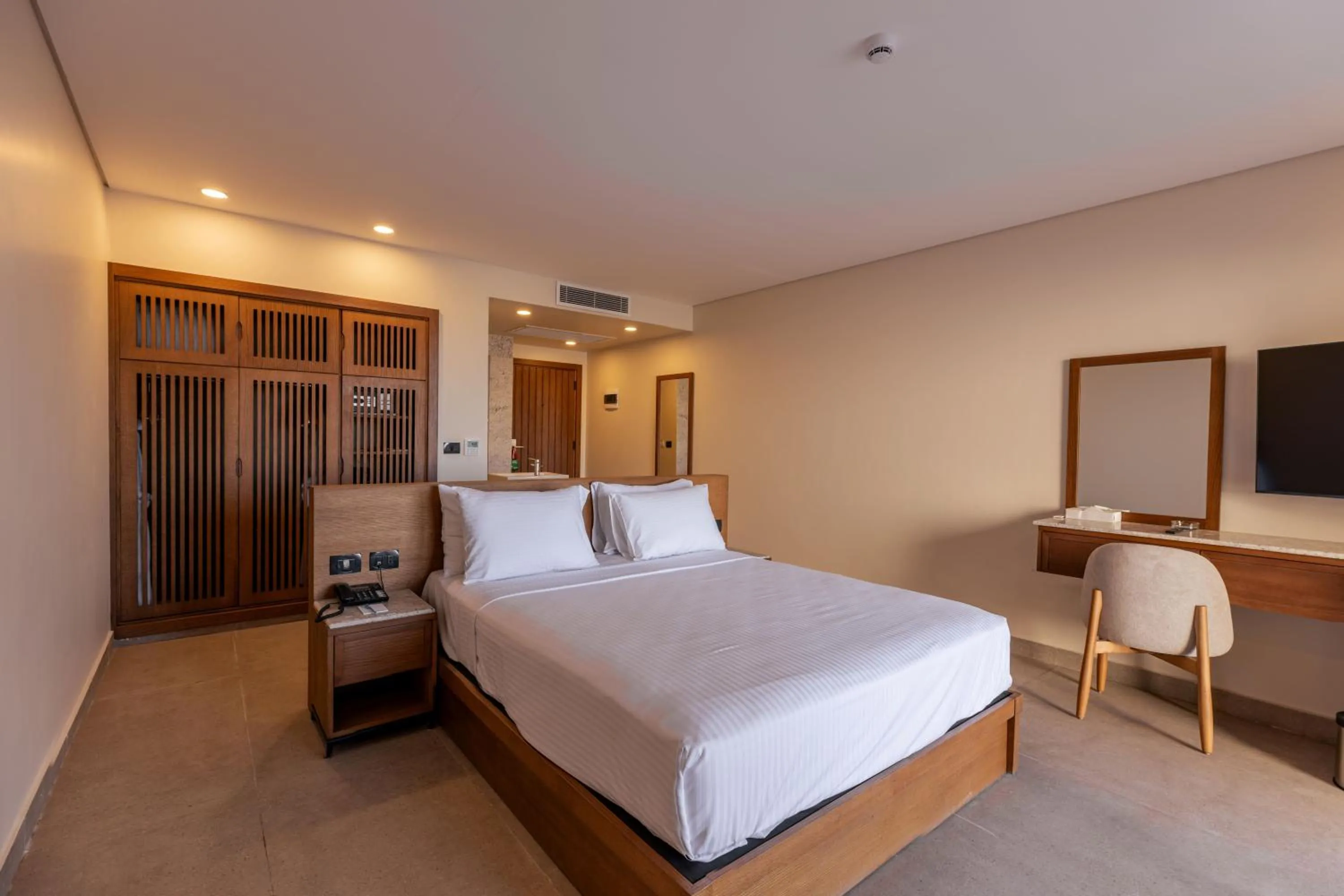 Bed in UTOPIA Blue Resort