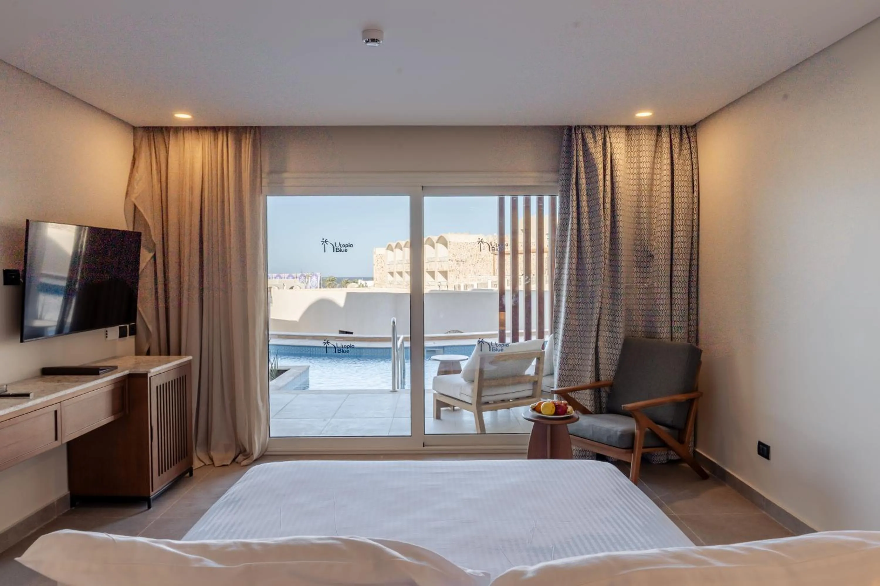 Bed in UTOPIA Blue Resort