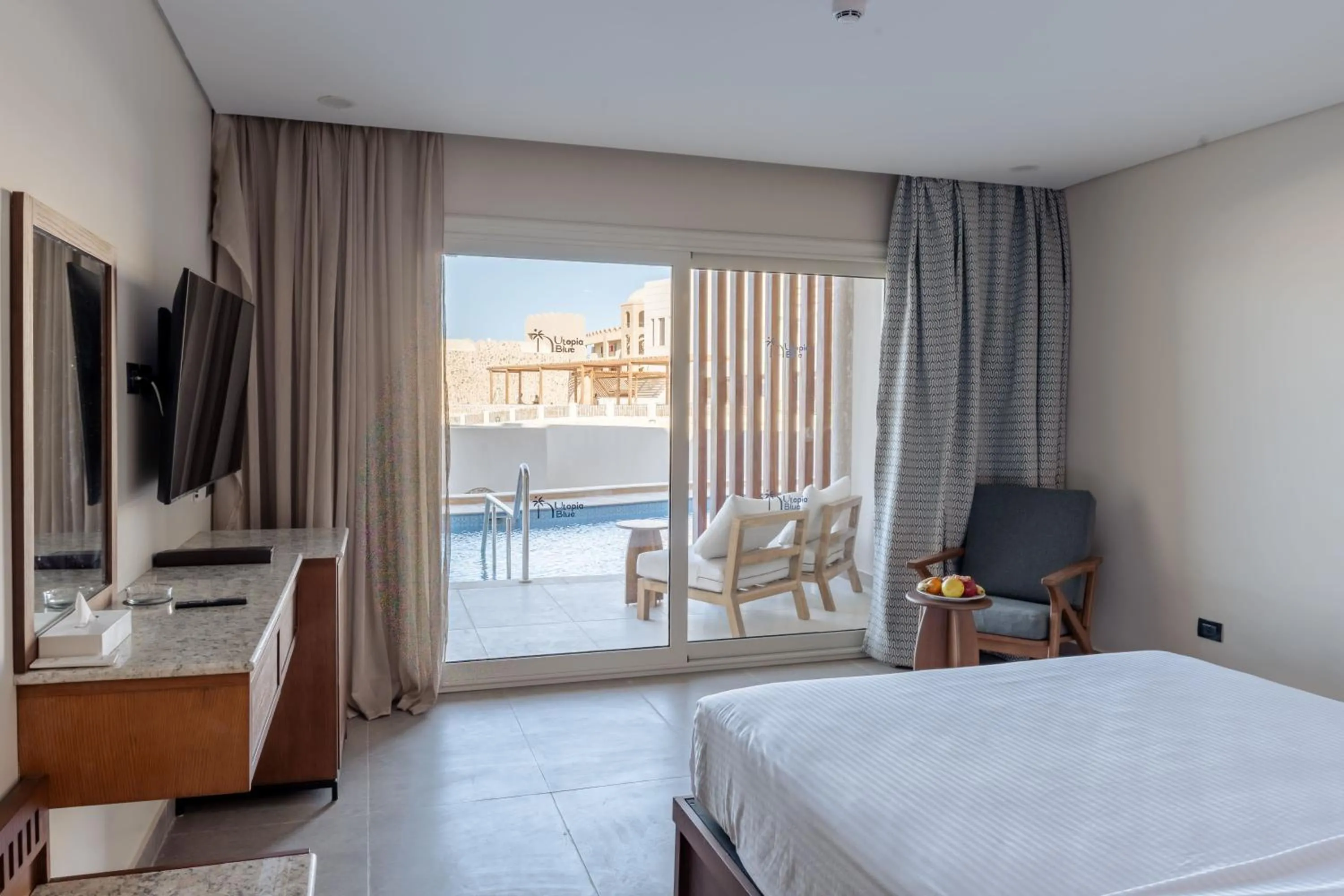 Bed in UTOPIA Blue Resort