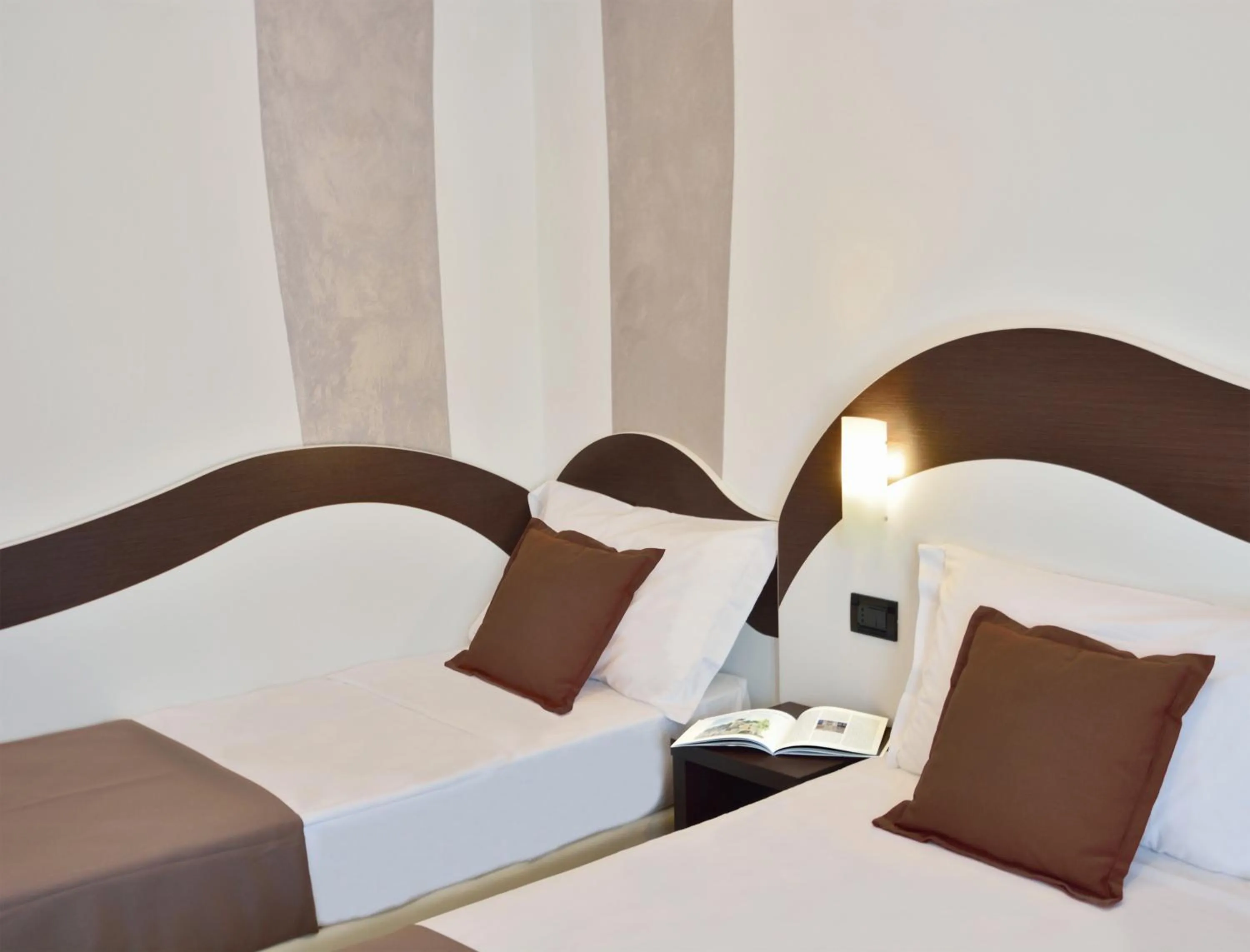 Bed in Hotel Luxor Florence