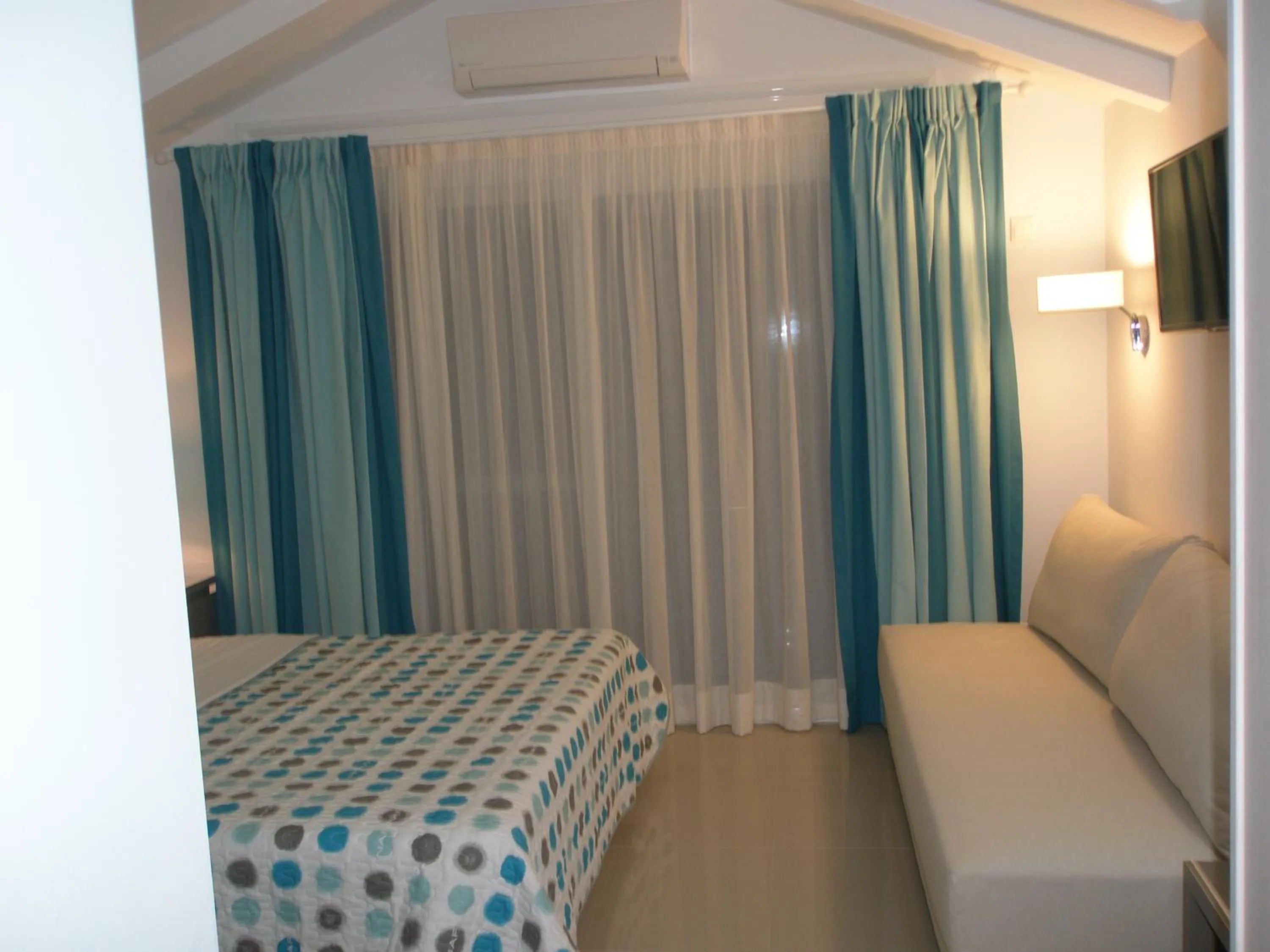Photo of the whole room, Bed in WhiteSands Beach Resort