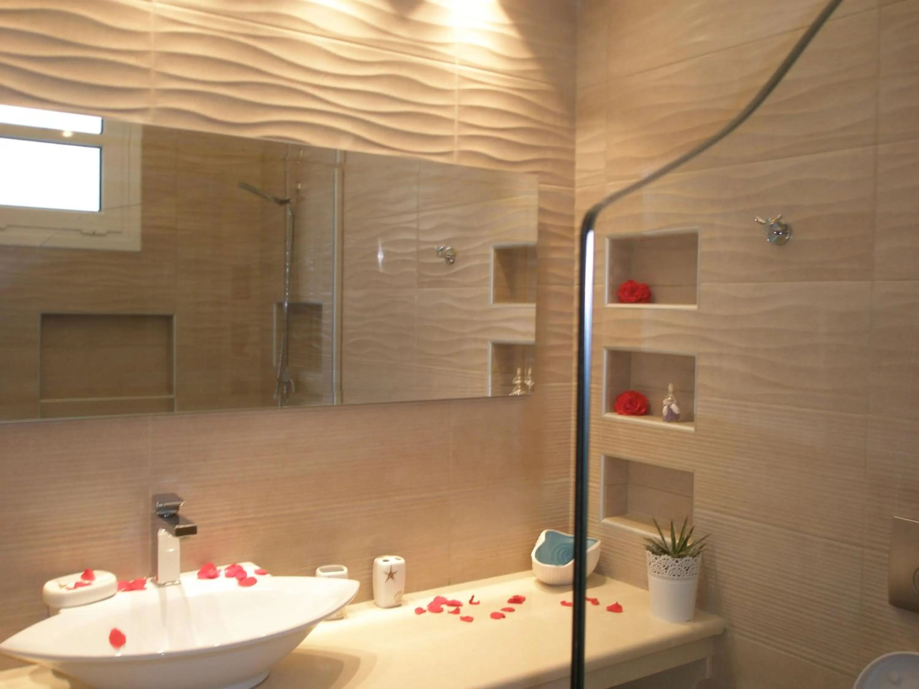 Bathroom in WhiteSands Beach Resort