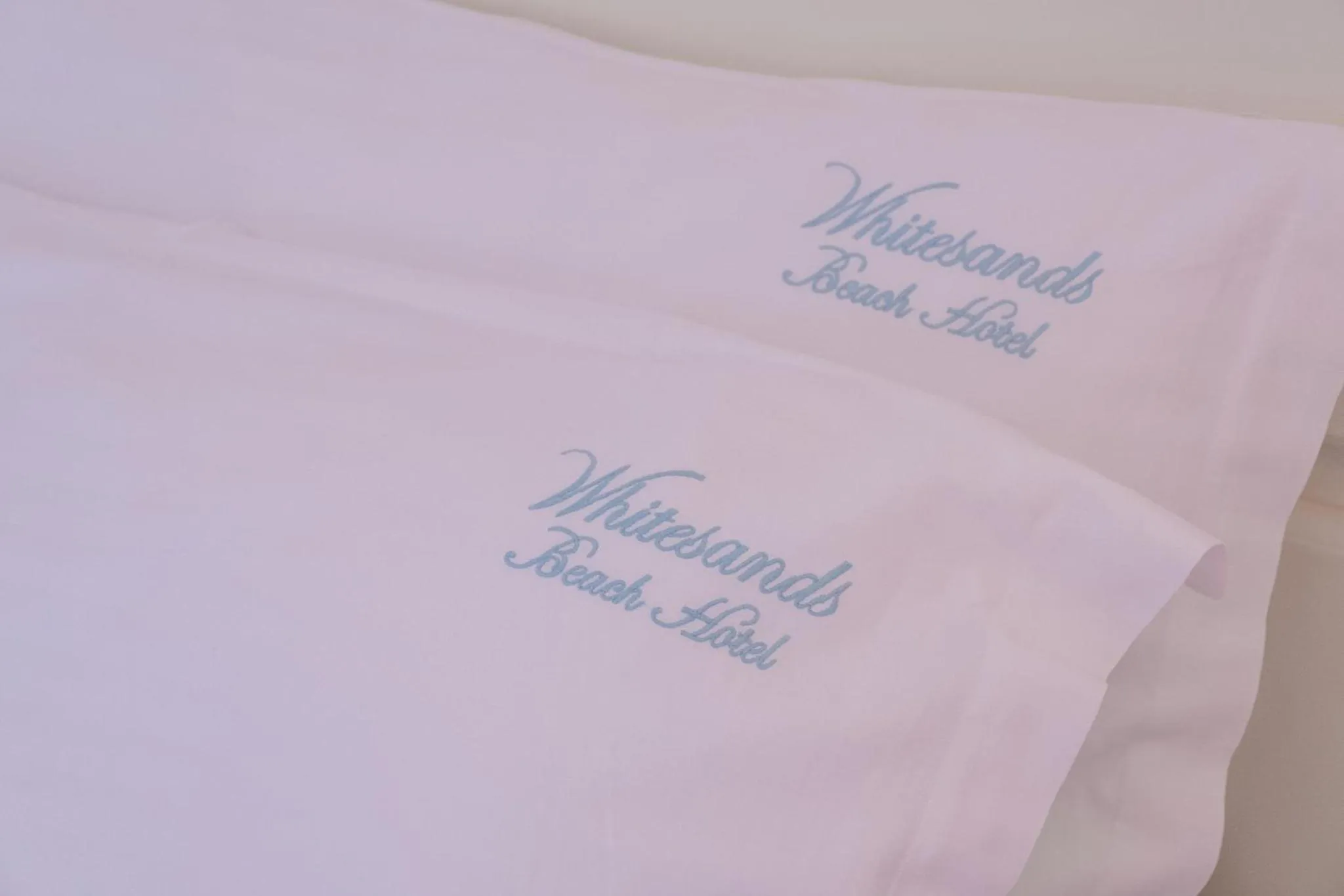 Property logo or sign, Bed in WhiteSands Beach Resort