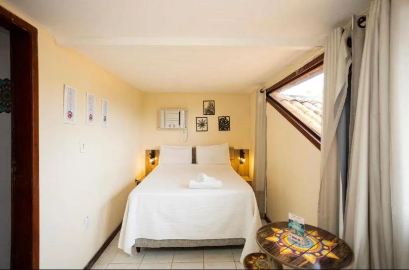Bed in EstrelaMar Ferradura Restaurante & Spa