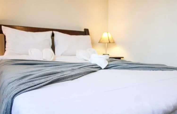 Bed in EstrelaMar Ferradura Restaurante & Spa