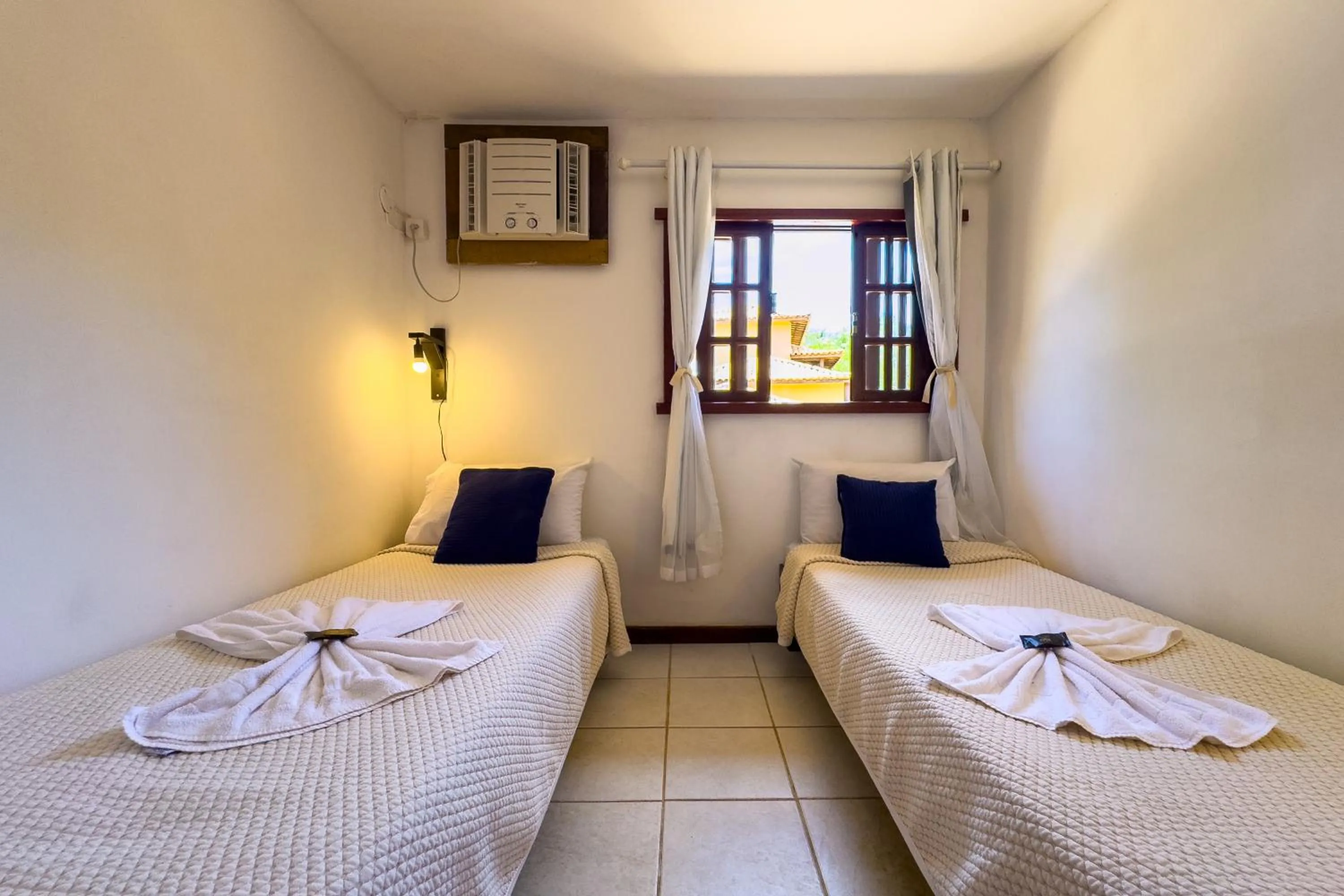 Bed in EstrelaMar Ferradura Restaurante & Spa