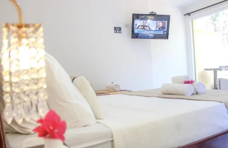 Bed in EstrelaMar Ferradura Restaurante & Spa