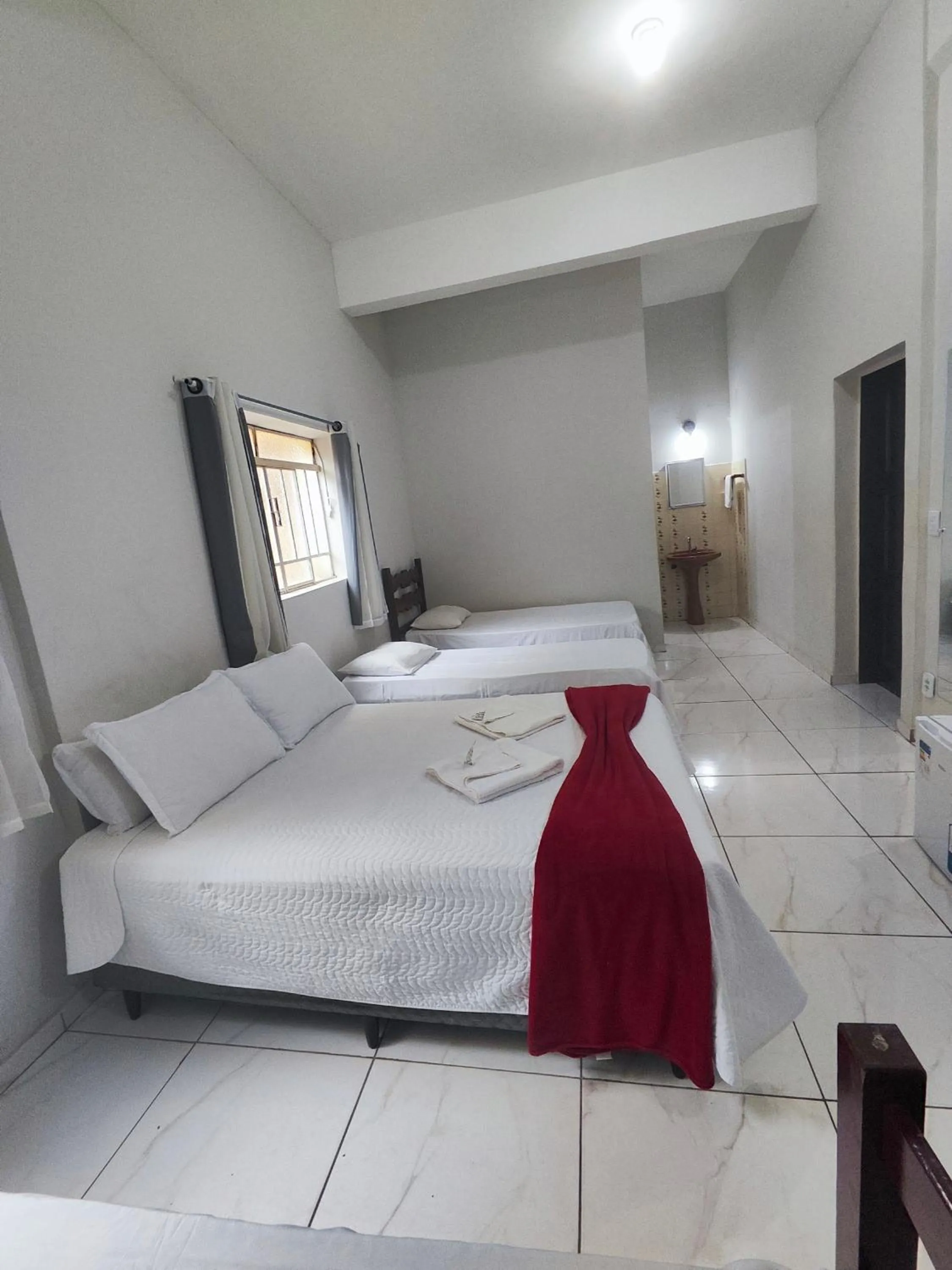 Bed in Pousada Sinhá Moça