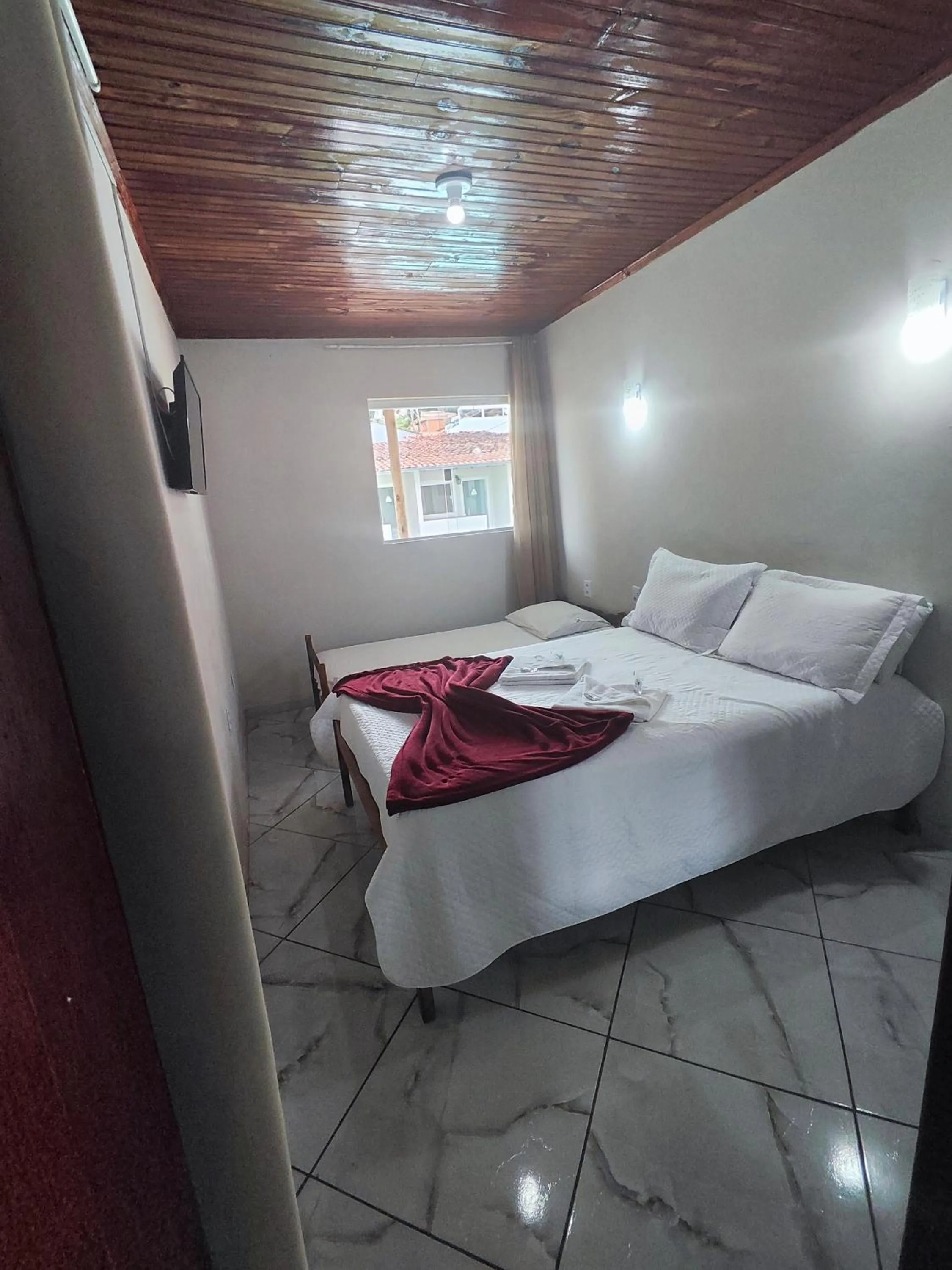 Bed in Pousada Sinhá Moça