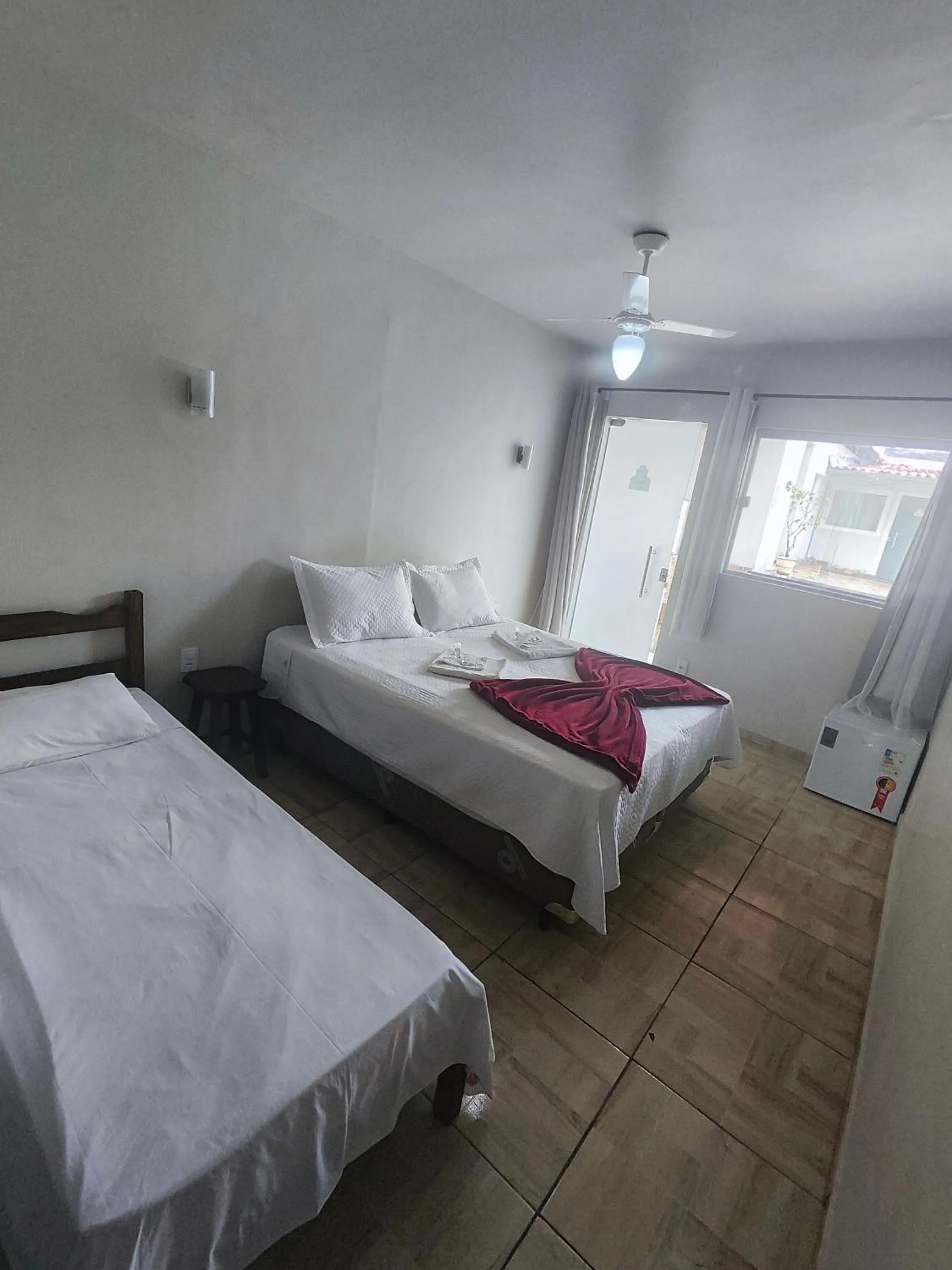 Bed in Pousada Sinhá Moça