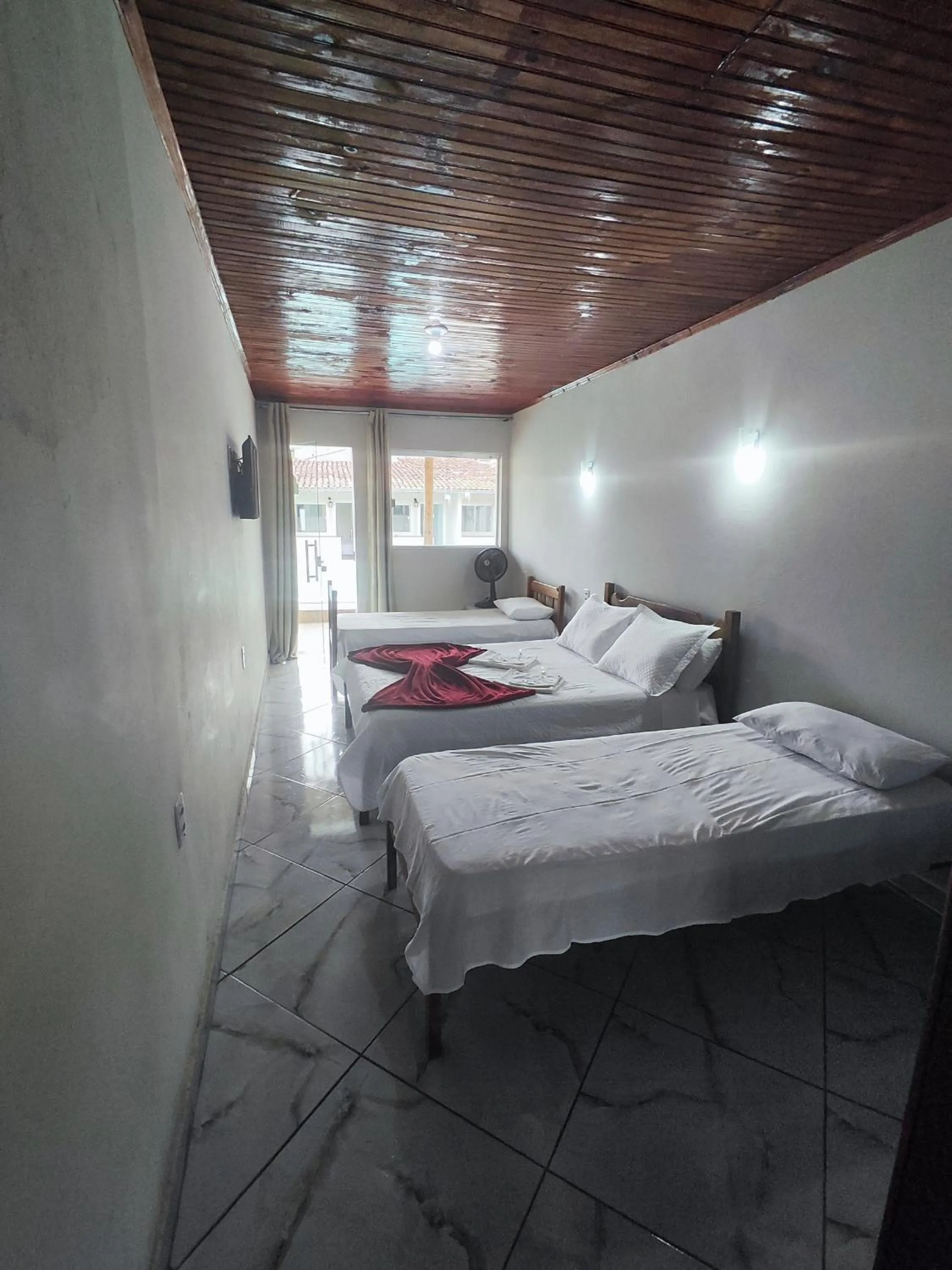 Bed in Pousada Sinhá Moça